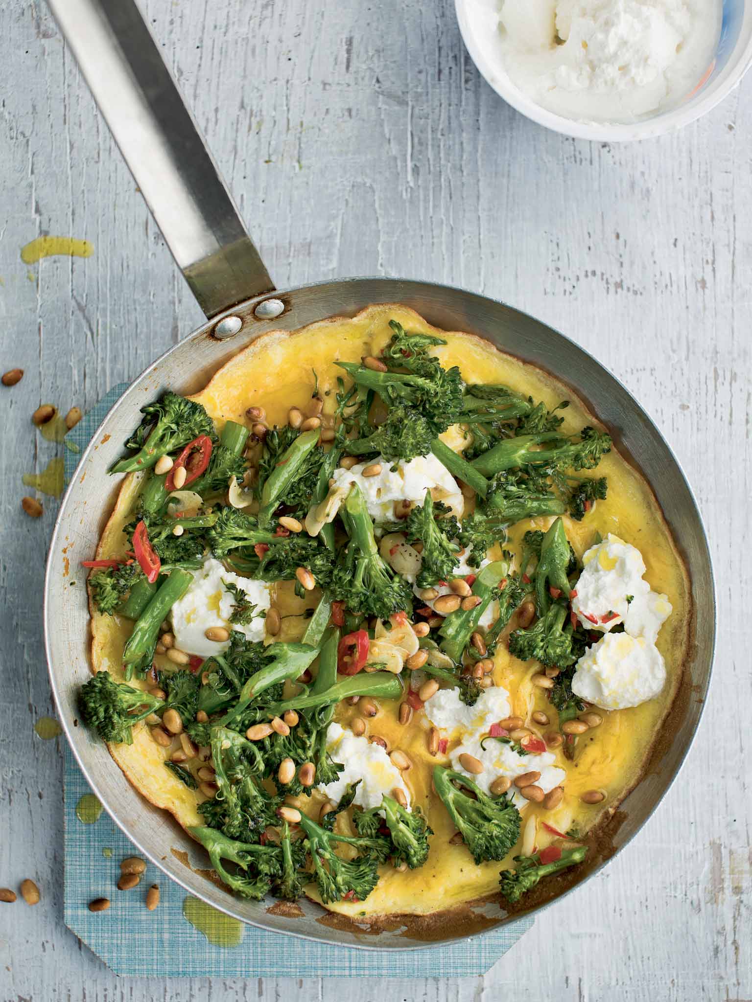Tenderstem broccoli omelette with ricotta and pine nuts