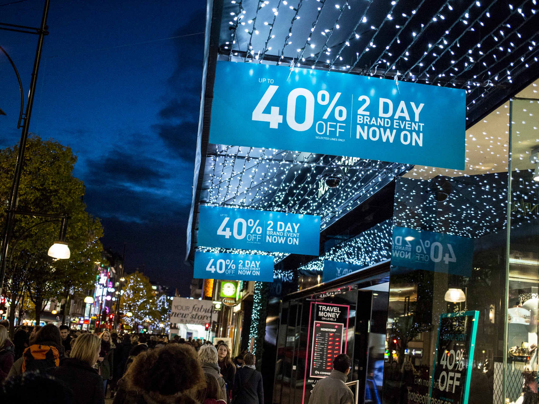 A high street clothing chain entices shoppers with a pre-Christmas sale on November 29, 2013 in London, United Kingdom.