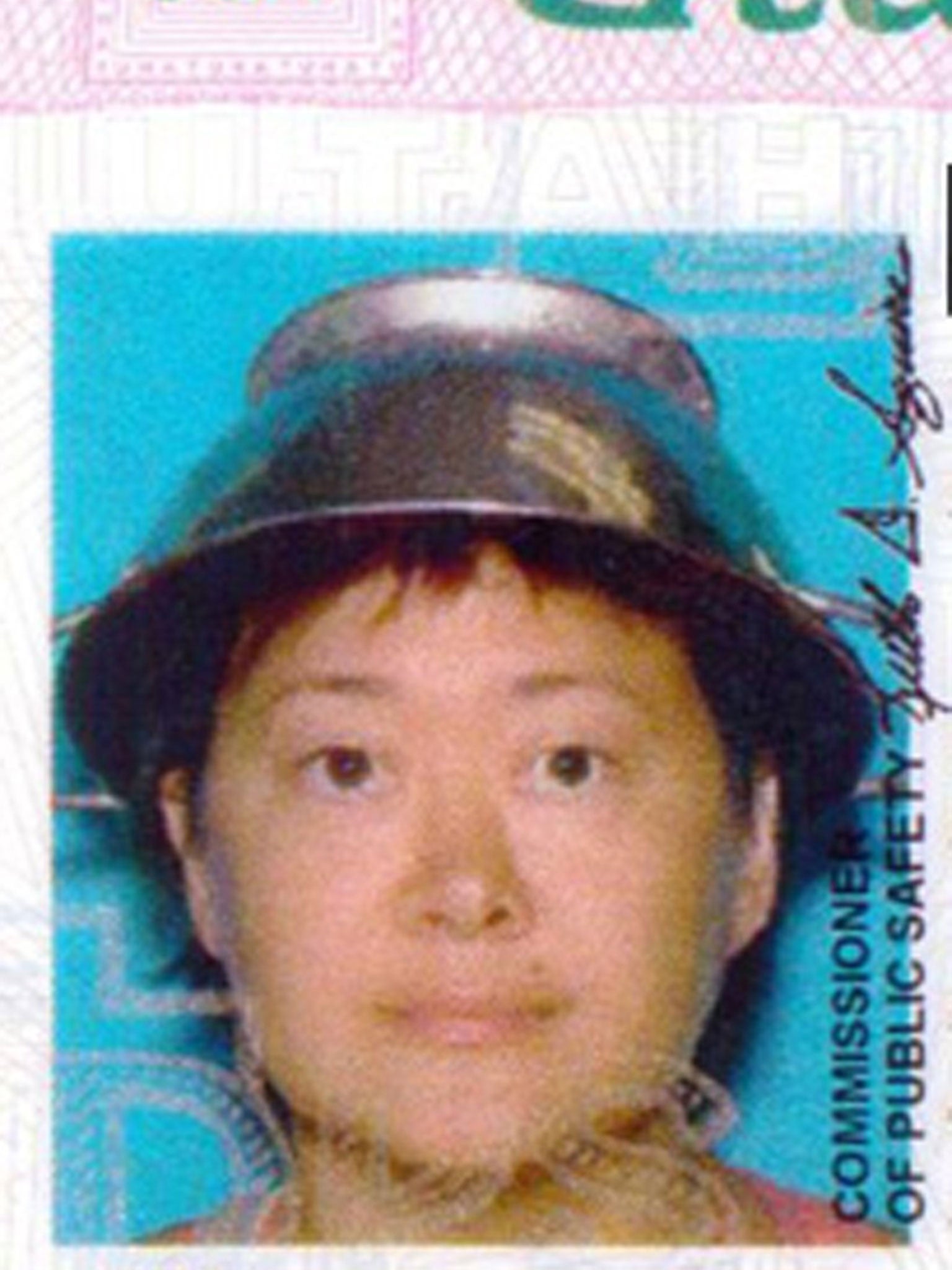 Asia Lemmon, whose legal name appears on her driverís license as Jessica Steinhauser, is shown wearing a metal colander on her head on her Utah driver's license in this undated photo