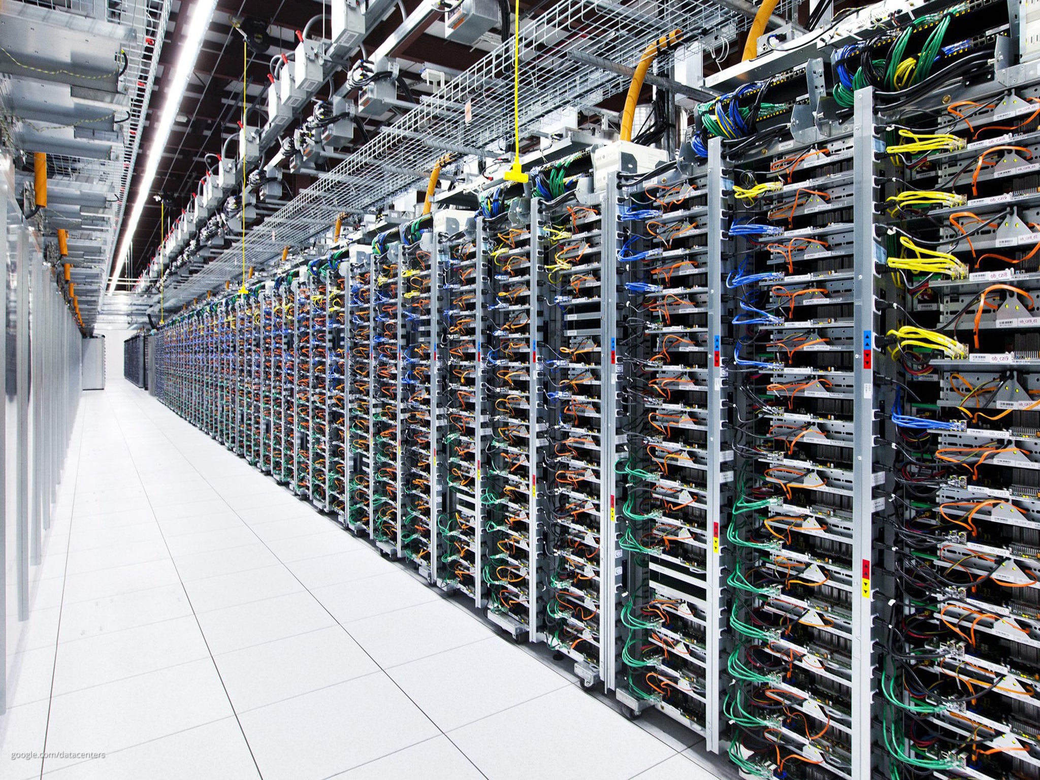 An undated handout photo provided by Google on 19 October 2012 shows rows of server racks in the Google data center in Pryor, Oklahoma.