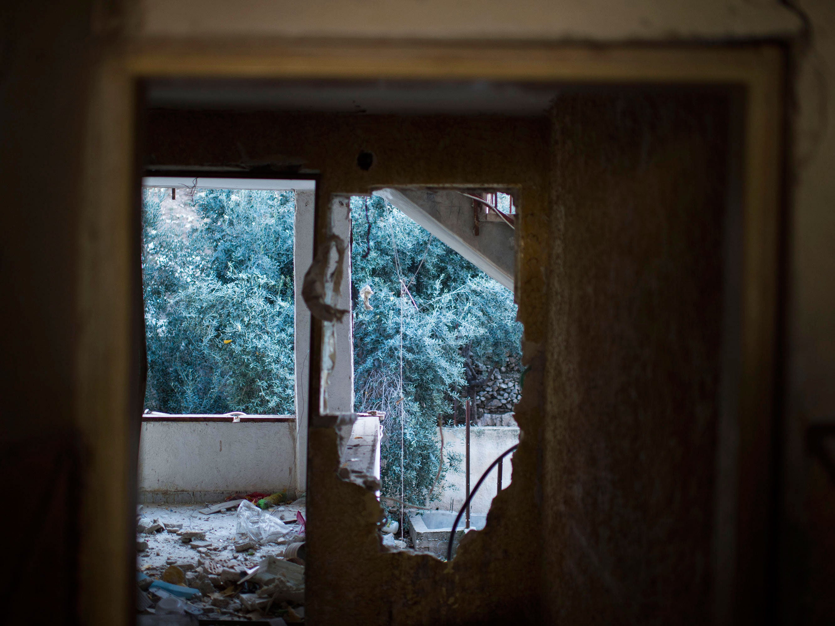 The interior of the damaged home of Abdel Rahman Al-Shaludi, the Palestinian who drove his car into passengers at a railway station causing the death of a 3-month-old baby last month