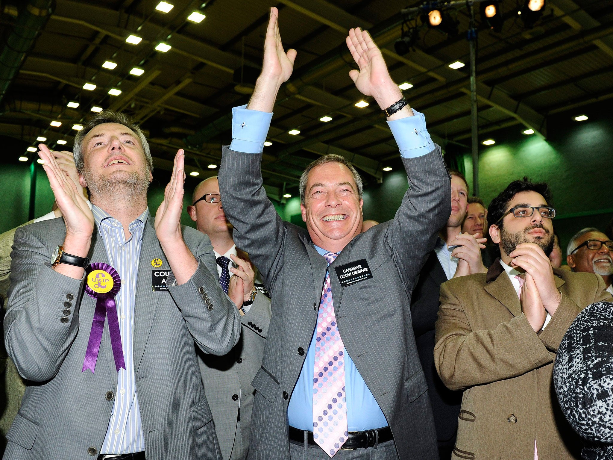 Nigel Farage and members of the UKIP team celebrate after Mark Reckless won the Rochester and Strood by-election at Medway Park, Gillingham near Rochester, Kent