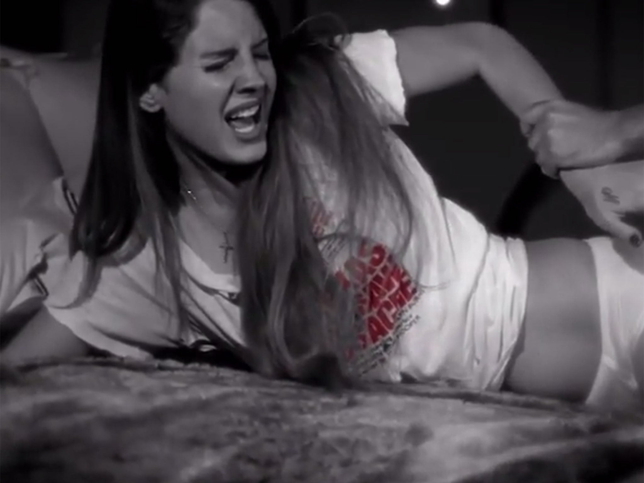 Lana Del Rey is seen being sexually assaulted in a video also featuring Marilyn Manson