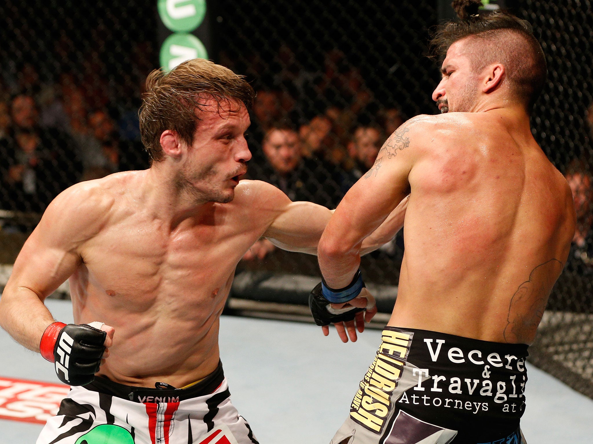 Brad Pickett lands a punch on Ian McCall