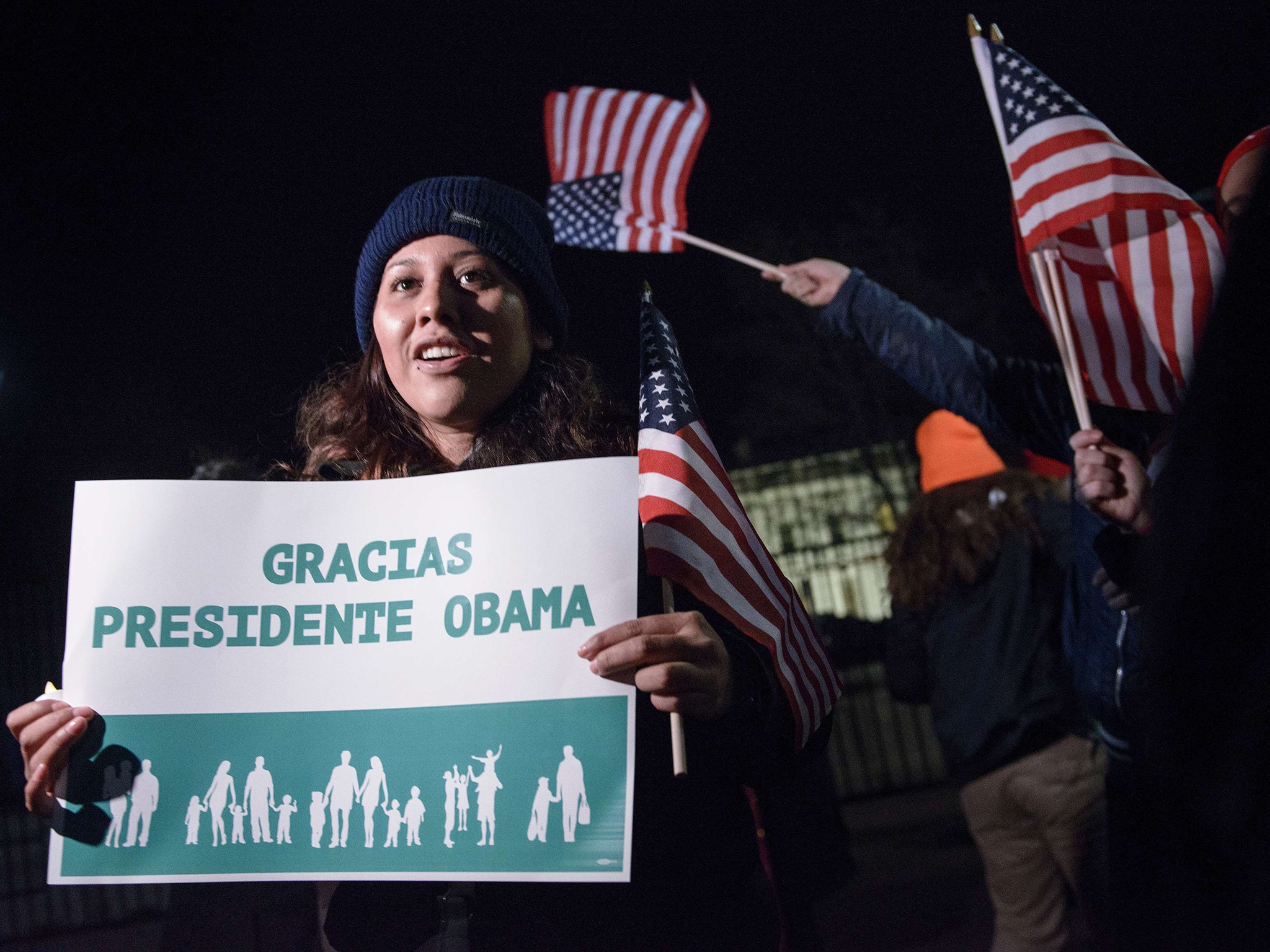 Activists celebrate the President’s action on immigration outside the White House