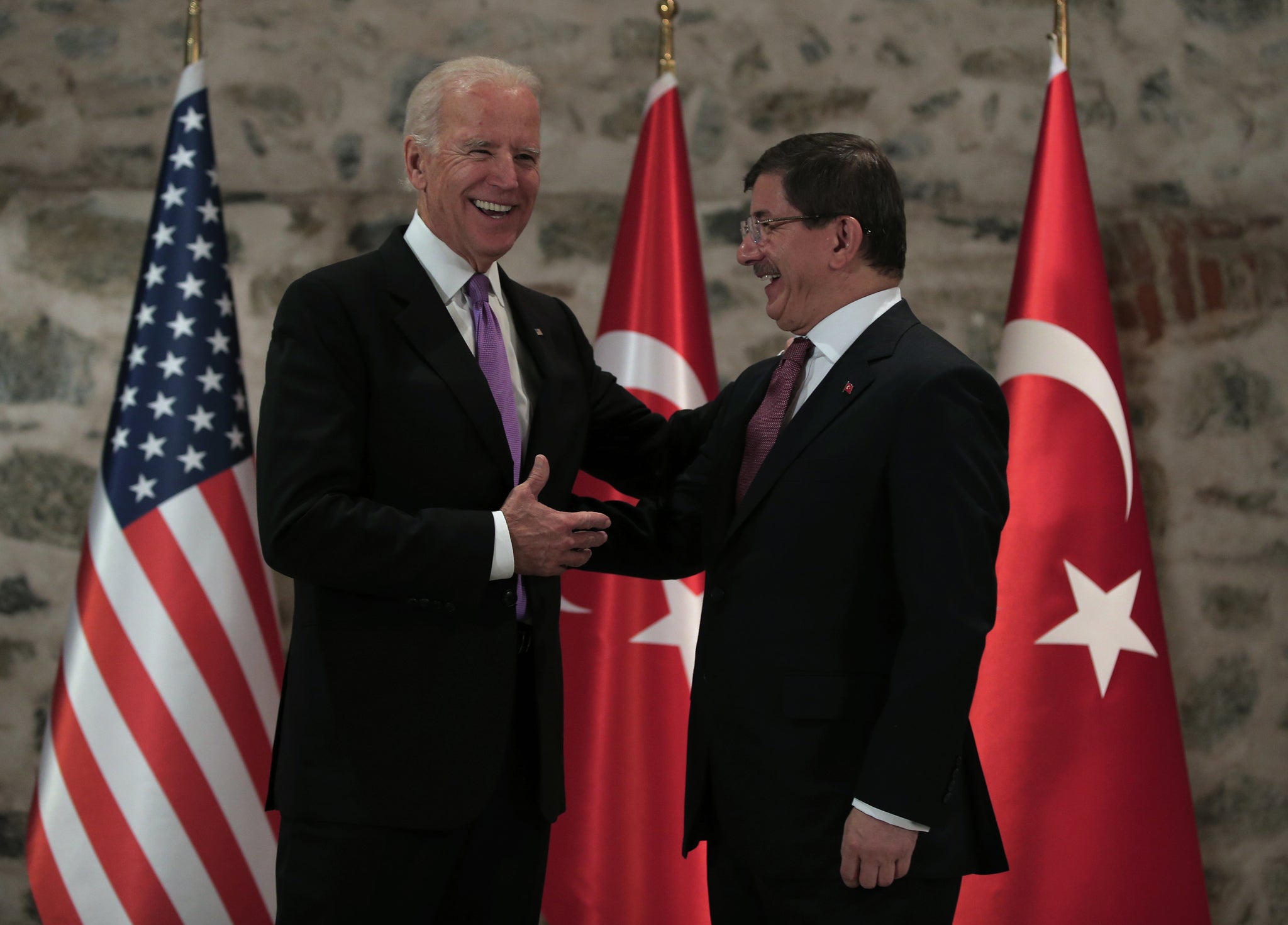 U.S. Vice President Joe Biden Turkish Prime Minister Ahmet Davutoglu joke before a meeting in Istanbul on Friday.