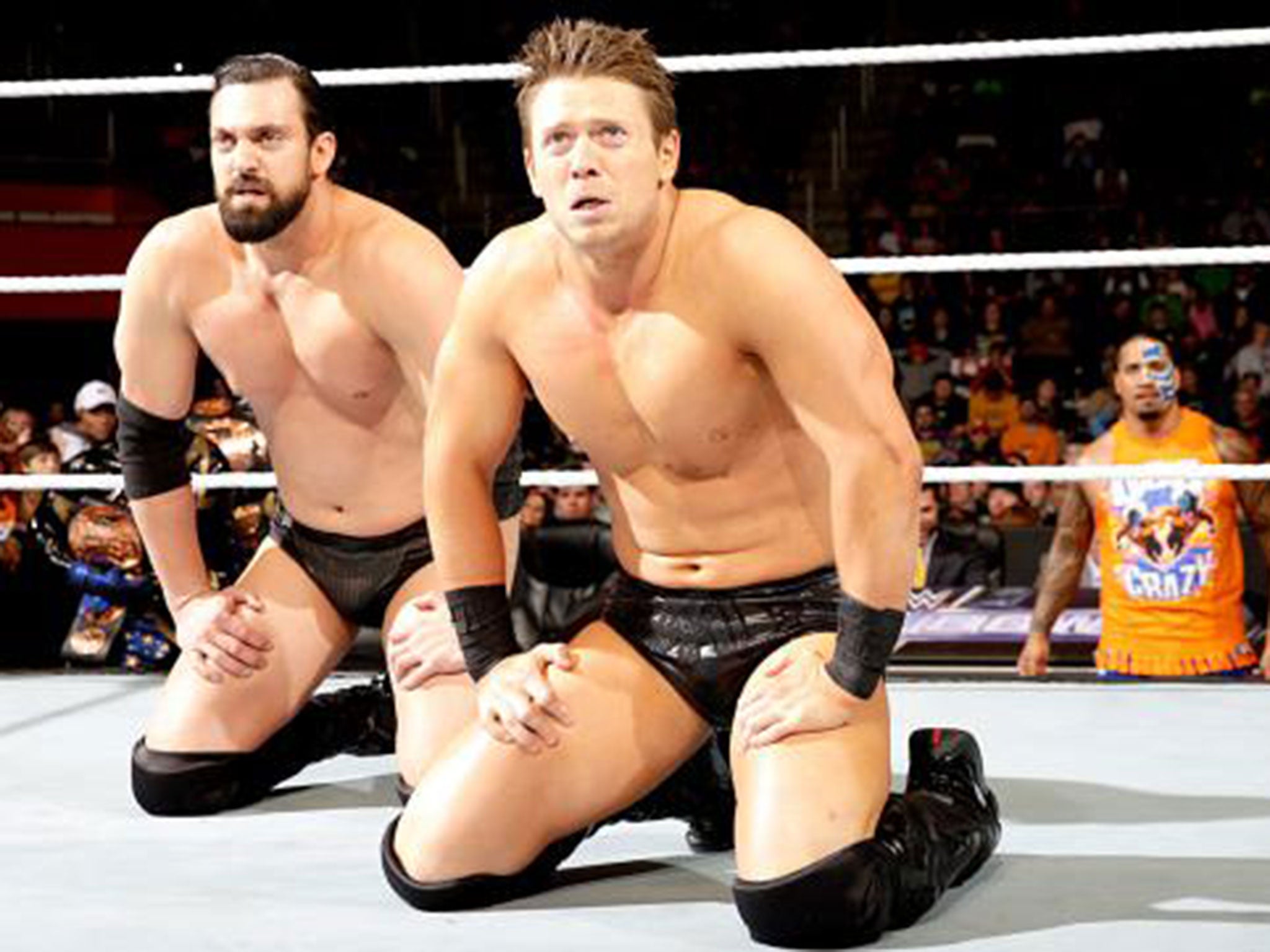 The Miz and Mizdow look on after defeat