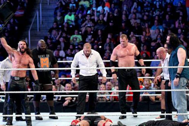 The Authority stand tall over members of Team Cena