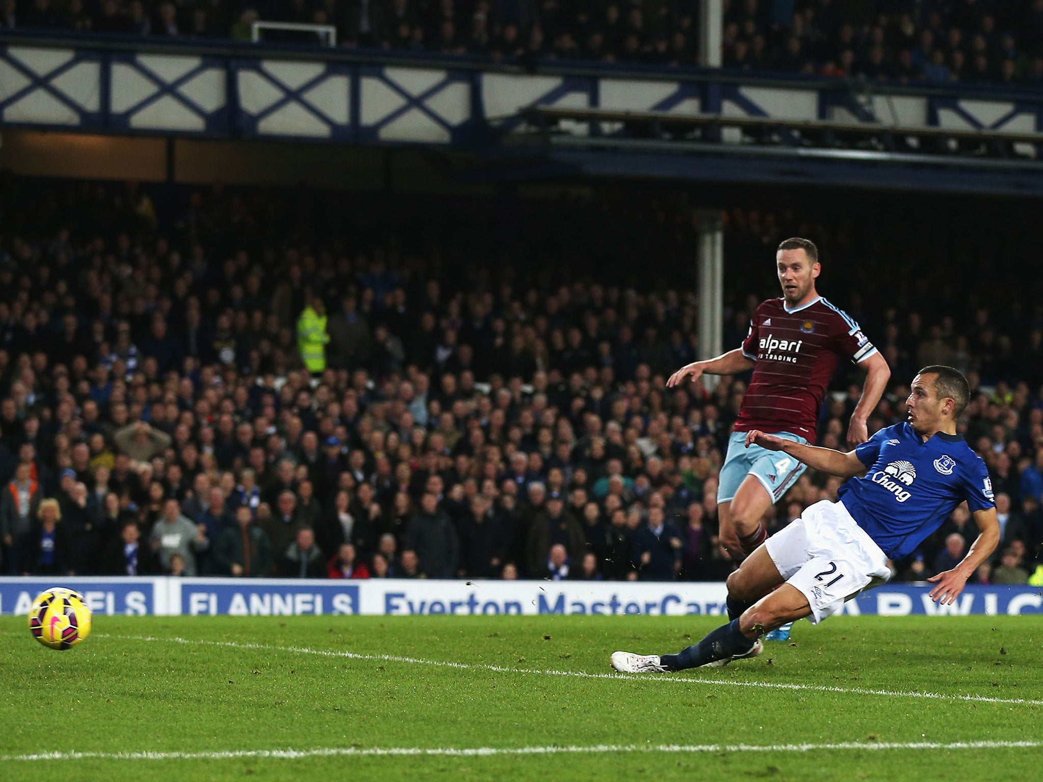 Leon Osman slides in to score Everton's winner