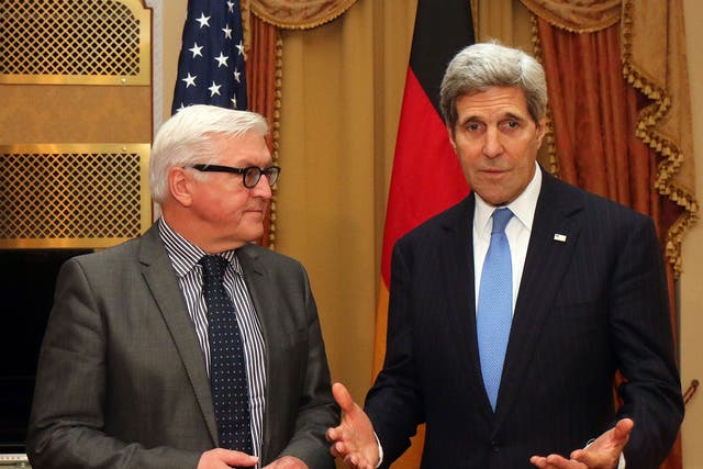 Frank-Walter Steinmeier, left, and John Kerry in Vienna