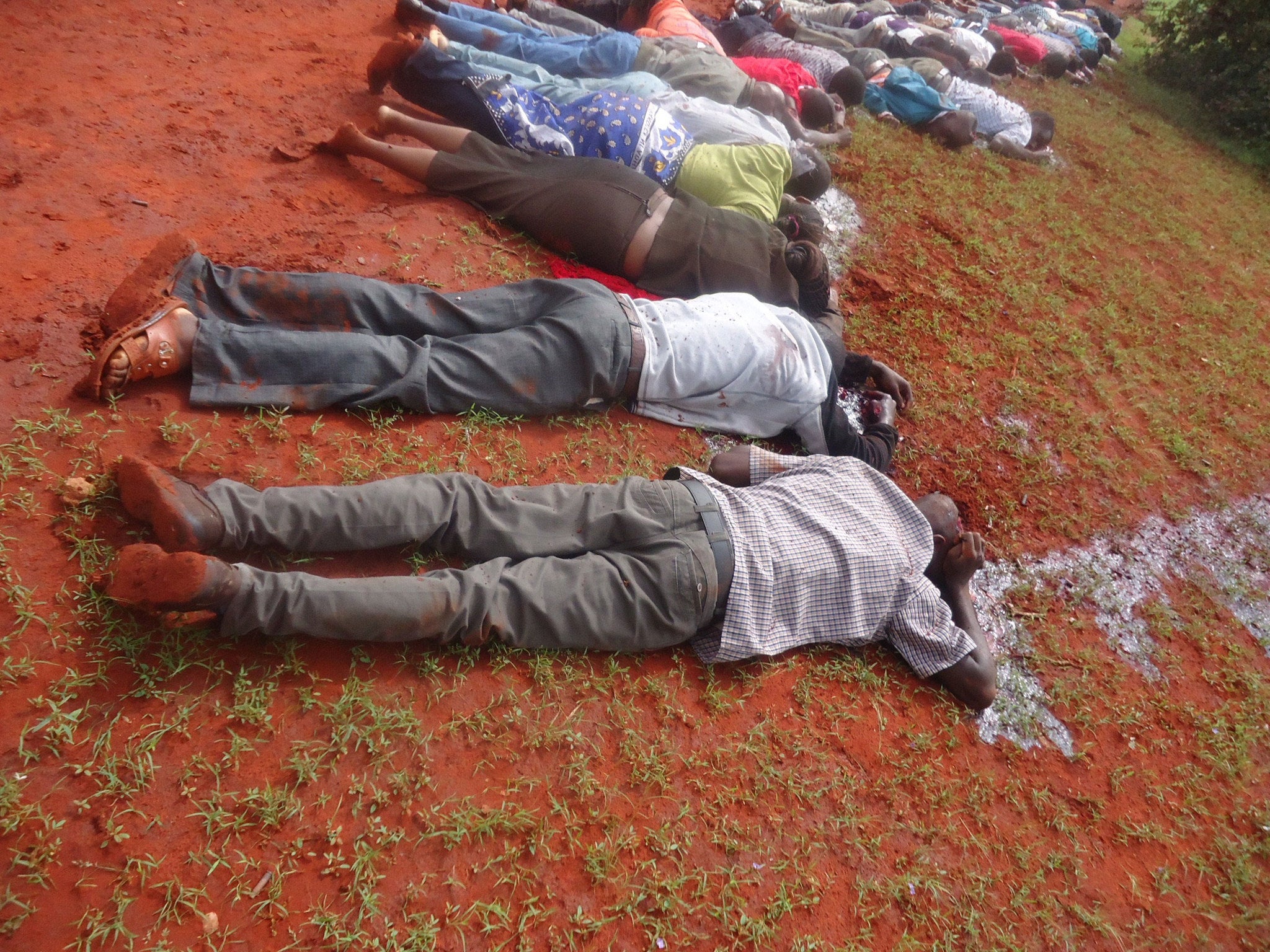 An ambulance carries bodies of the victims killed in the Mandera bus attack on November 22, 2014 in Nairobi Kenya