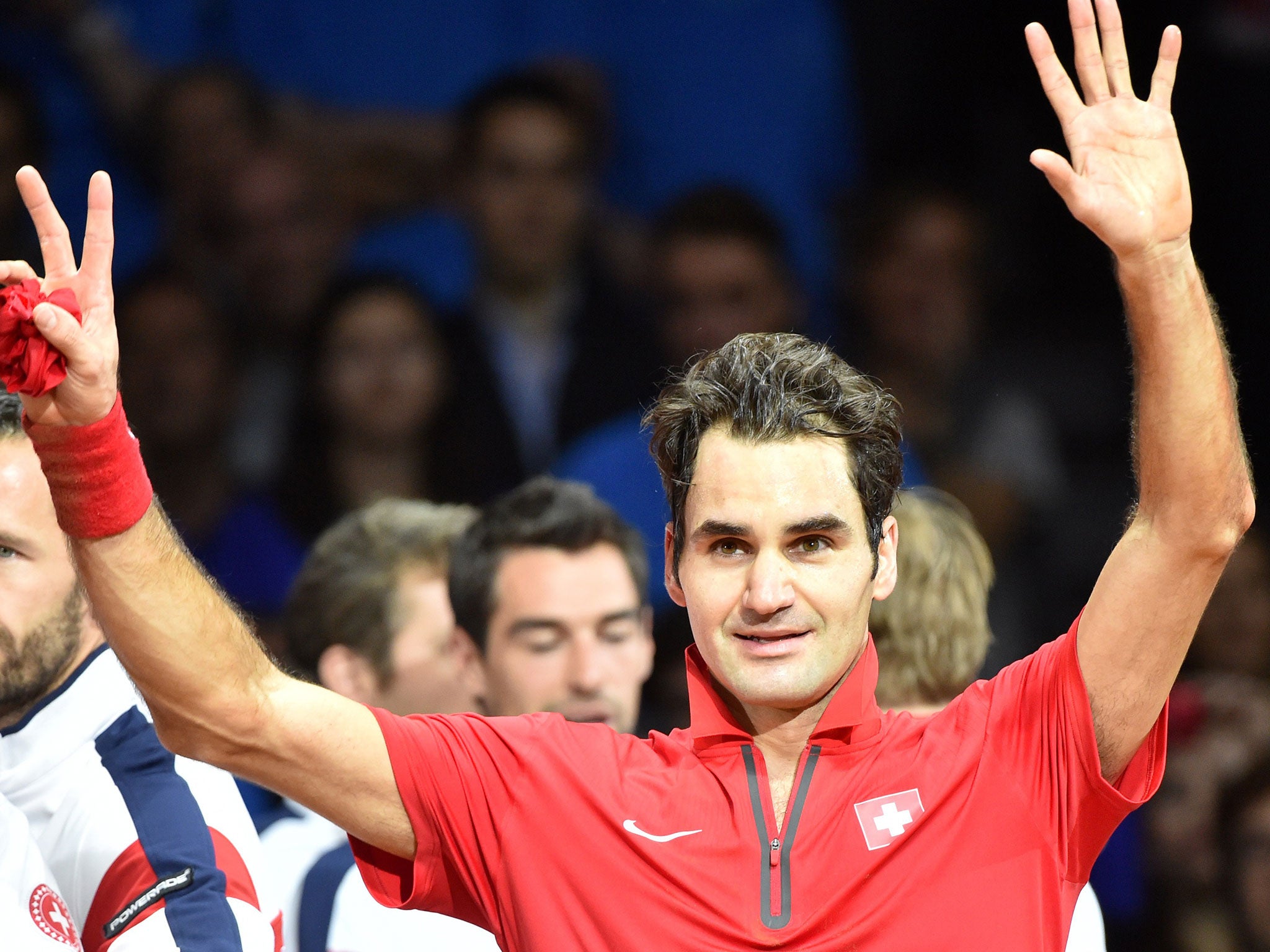 Roger Federer celebrates Switzerland's David Cup success