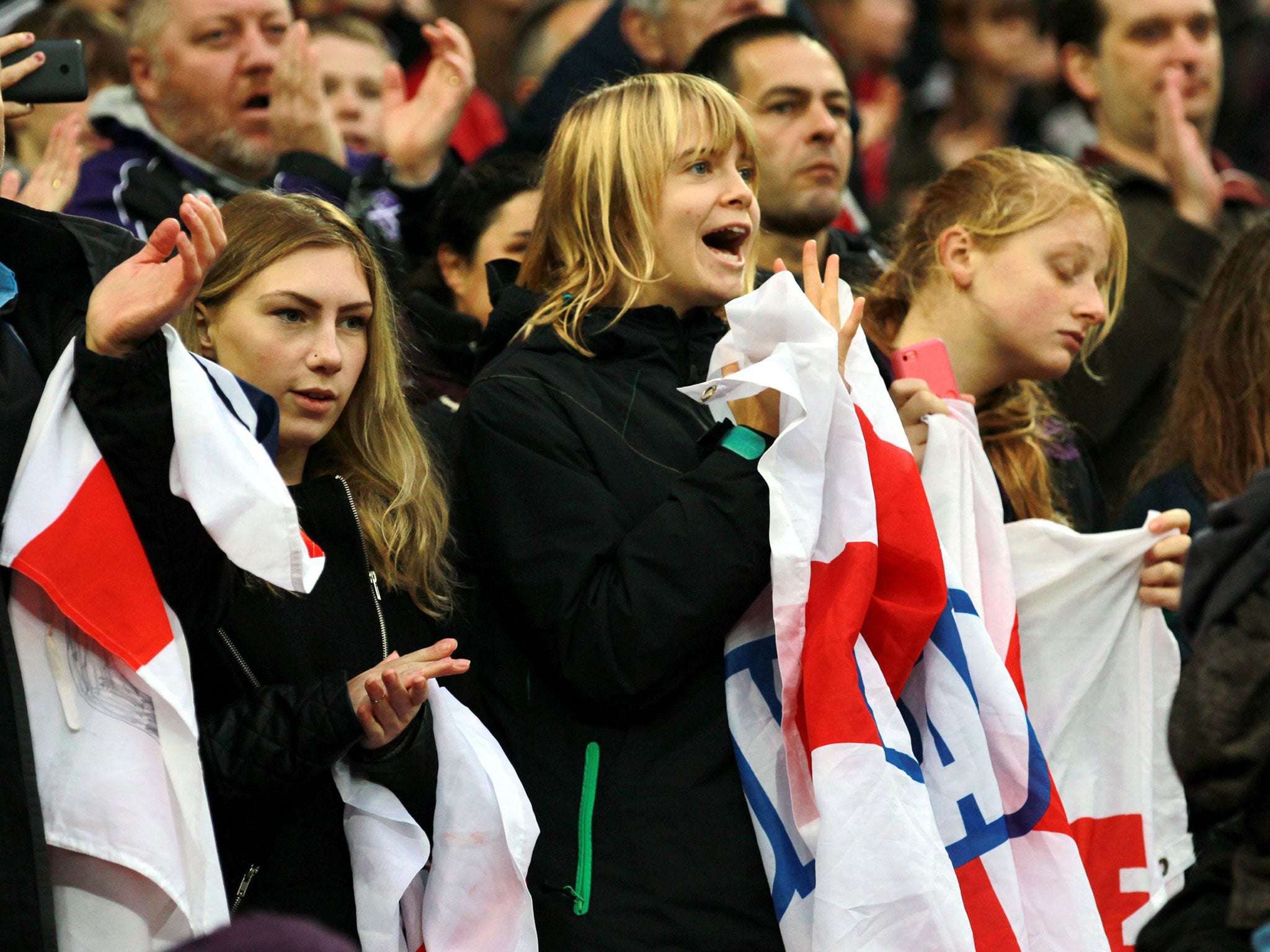 England fans show their loyalty before the friendly match against Germany at Wembley stadium