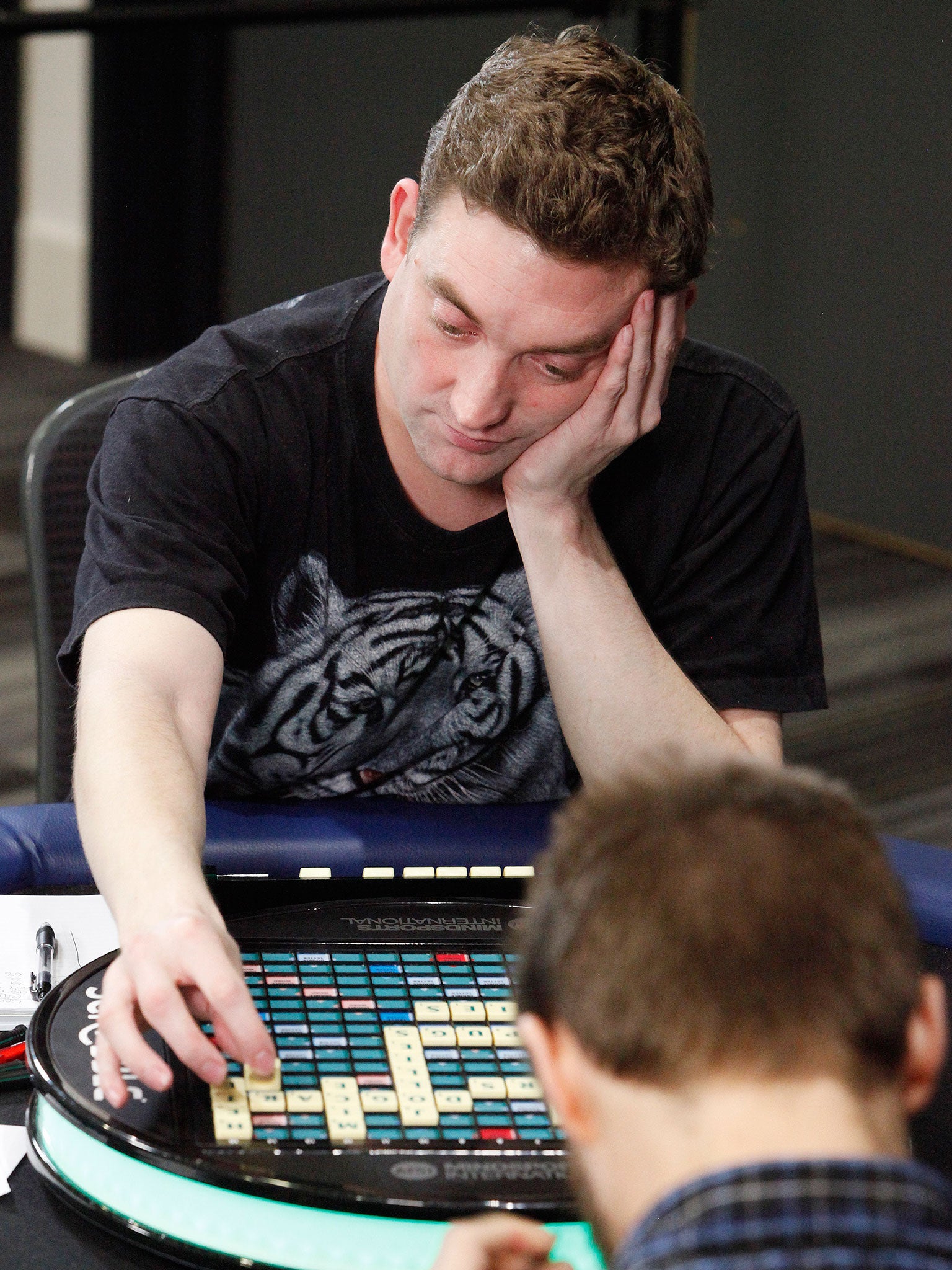 Scrabble champion Craig Beevers, 33, top, beat Chris Lipe from Clinton, New York