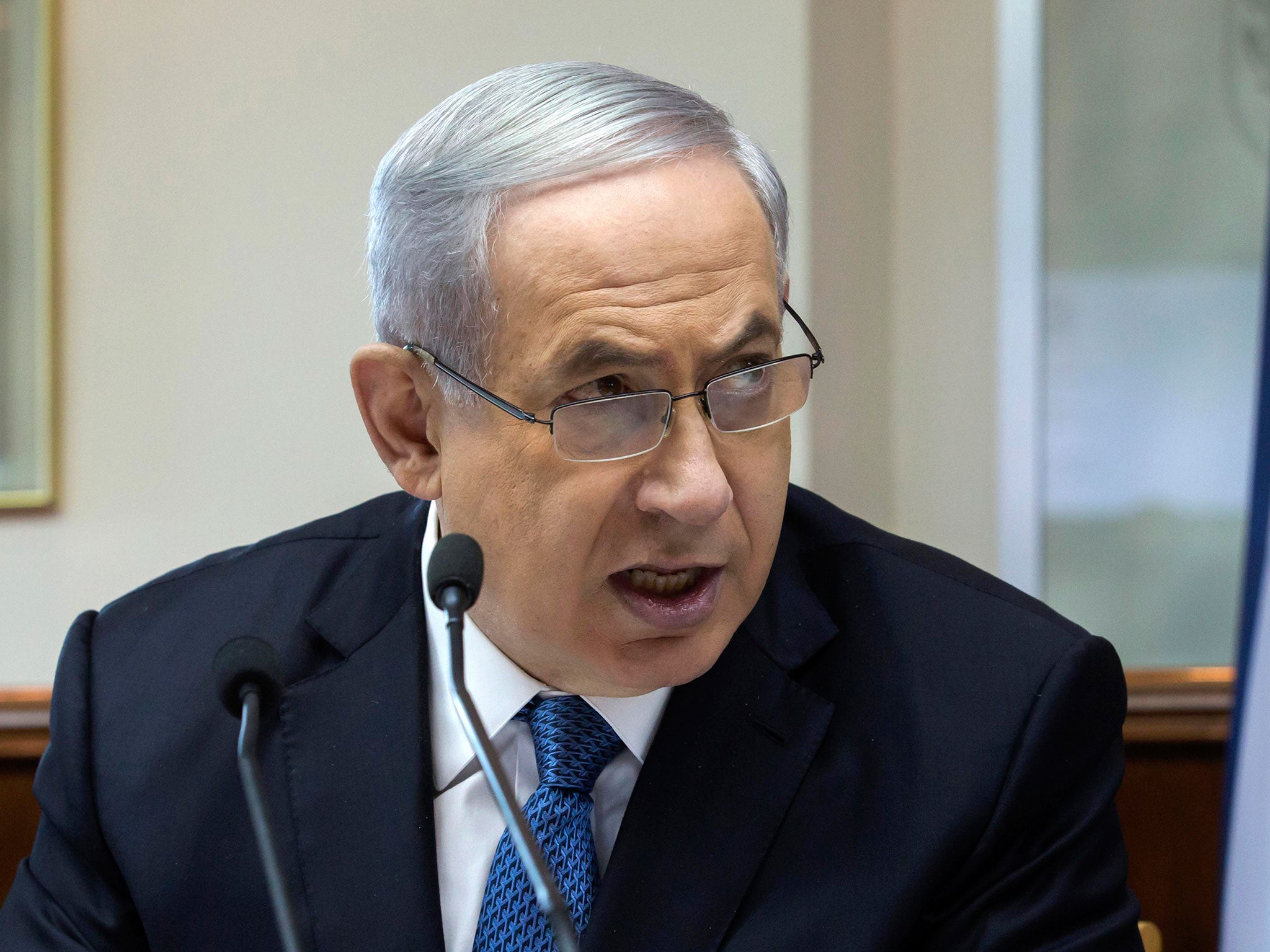 Prime Minister Benjamin Netanyahu’s cabinet backed draft legislation aimed at strengthening the Jewish character of the Israeli state, a move liberals warn will undermine democracy and heighten discrimination against Arab citizens
