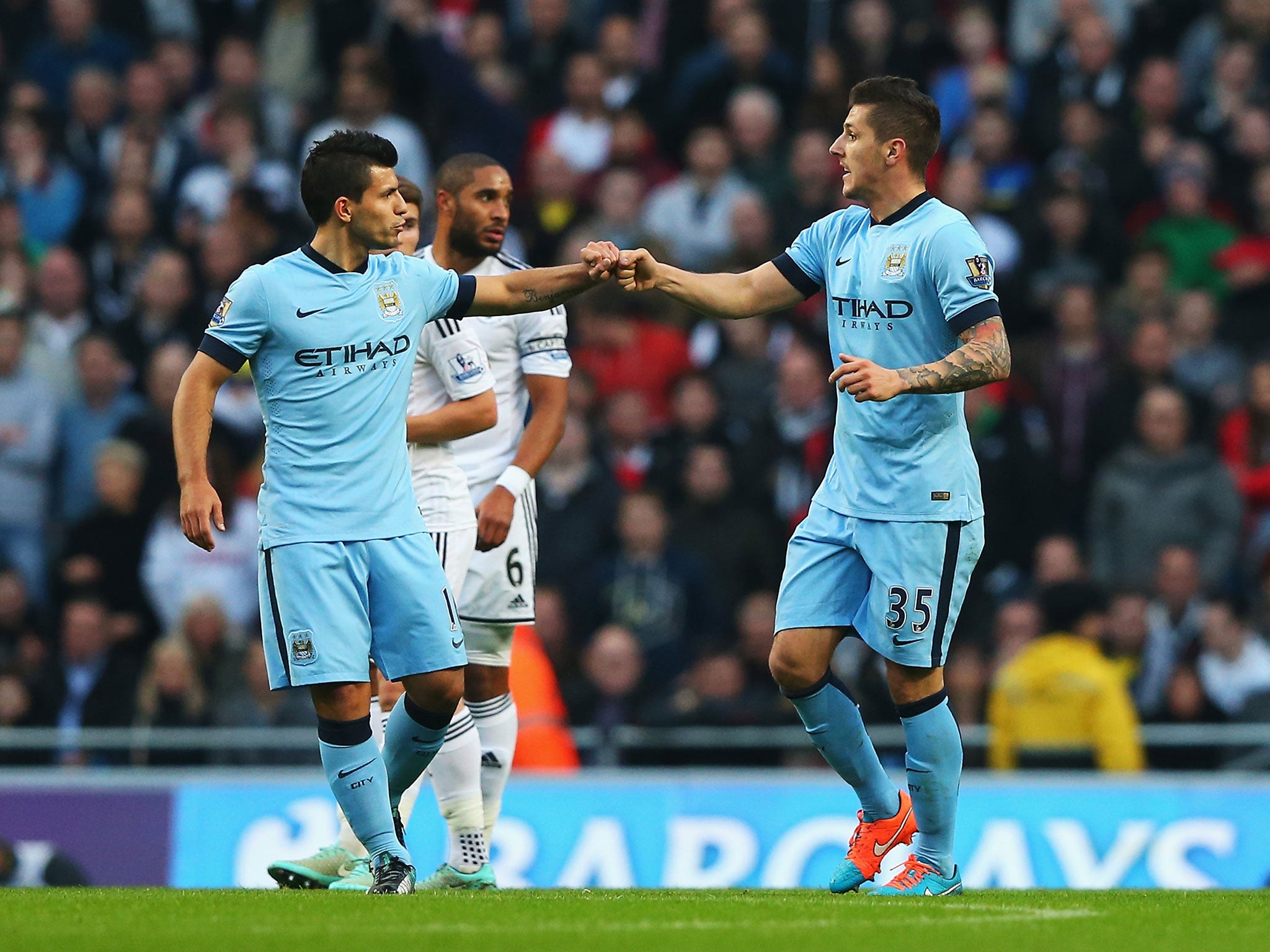 Sergio Aguero and Stevan Jovetic celebrate after the latter scores against Swansea