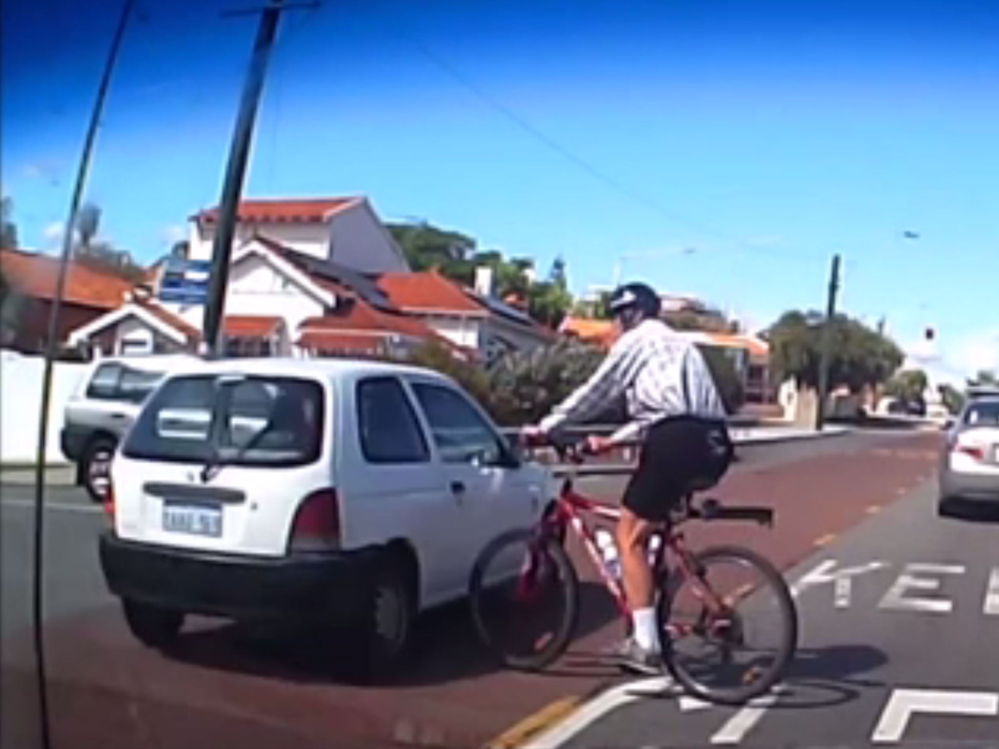 Watch a cyclist's near-miss with a car in Australia.