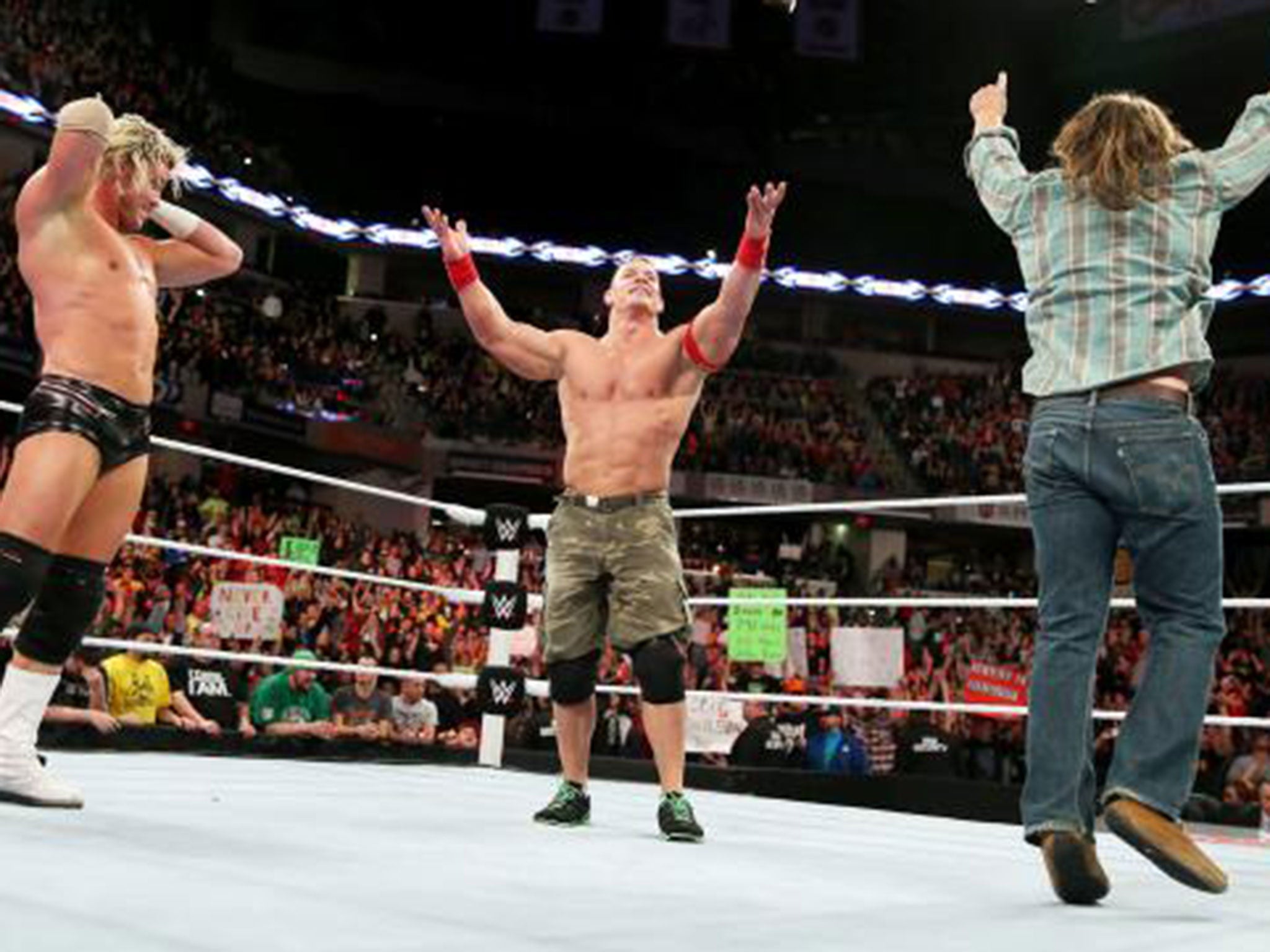Dolph Ziggler, John Cena and Daniel Bryan celebrate at the end of Raw