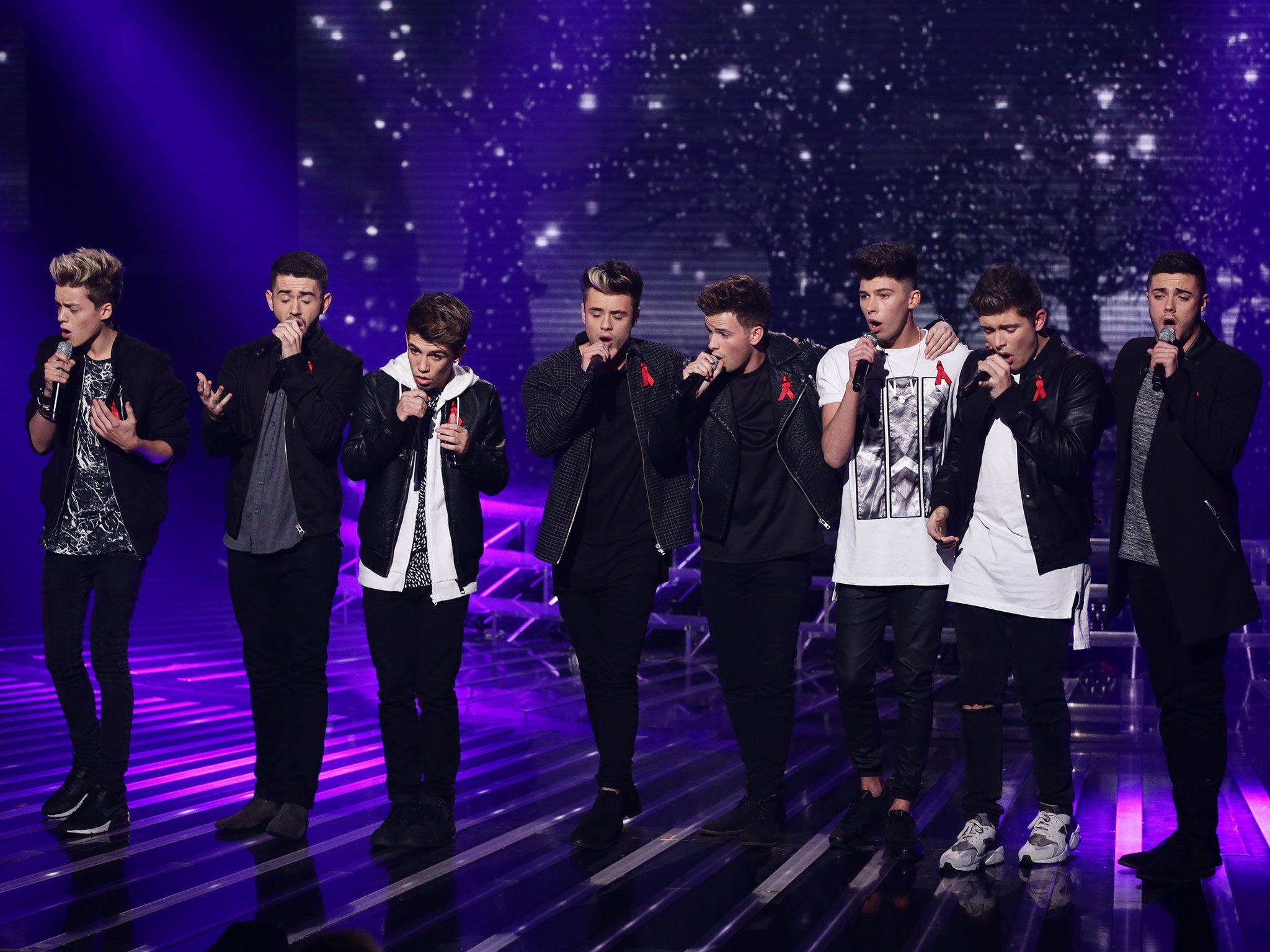 Eight-piece boy band Stereo Kicks have been sent home from the X Factor leaving mentor Louis Walsh without a single act remaining in the competition