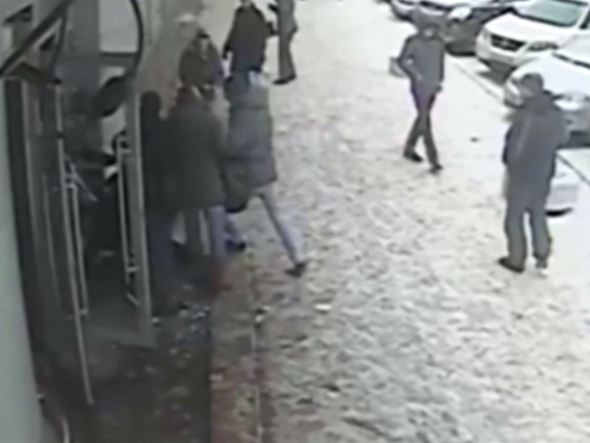 Suspected criminal in Russia runs into glass door.