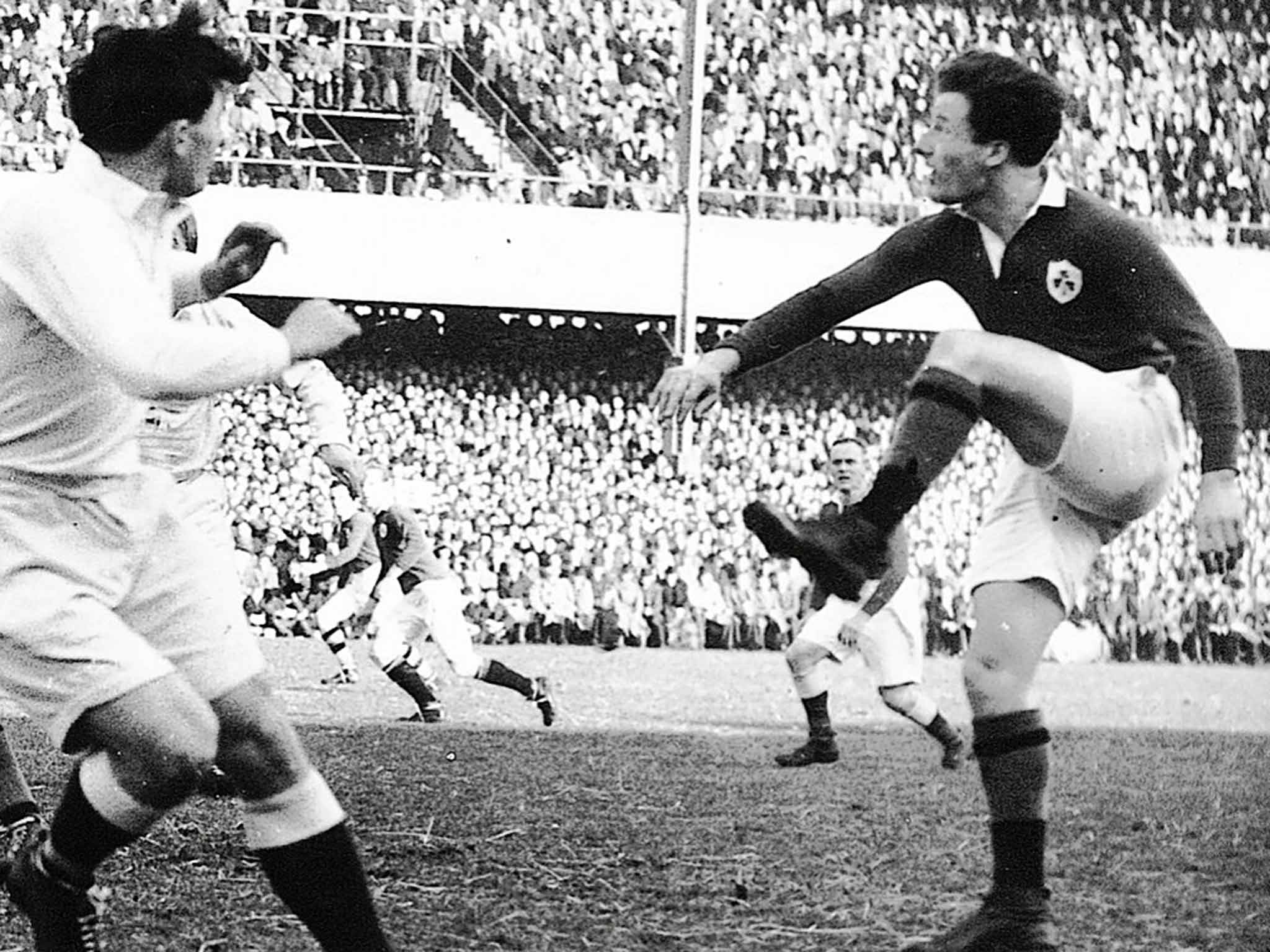 Kyle kicks from a scrum playing for Ireland against England at Lansdowne Road in 1949