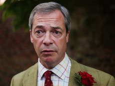 Woman confronts Nigel Farage about racism