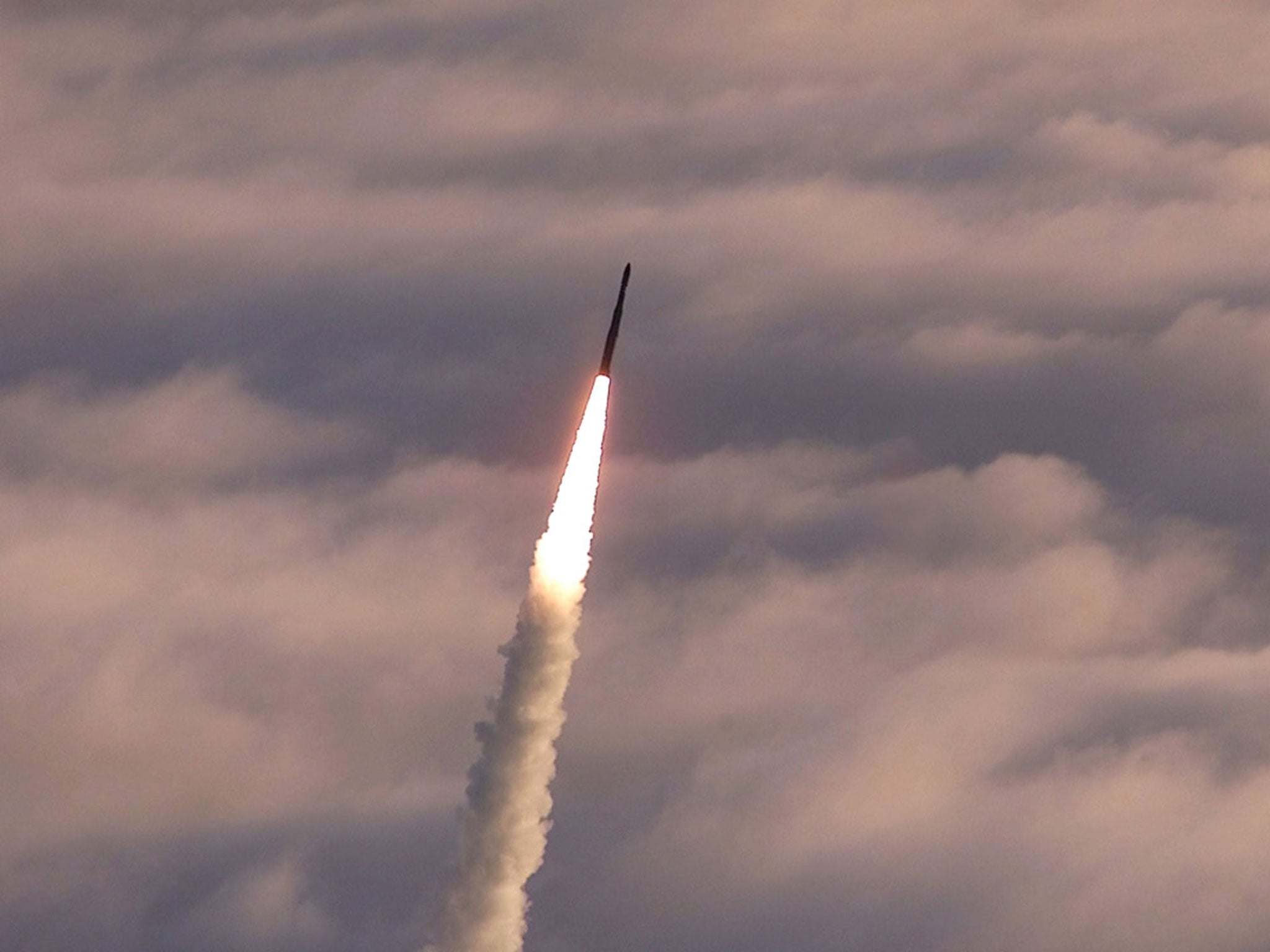 An unarmed Minuteman II intercontinental ballistic missile launches from Vandenberg Air Force Base