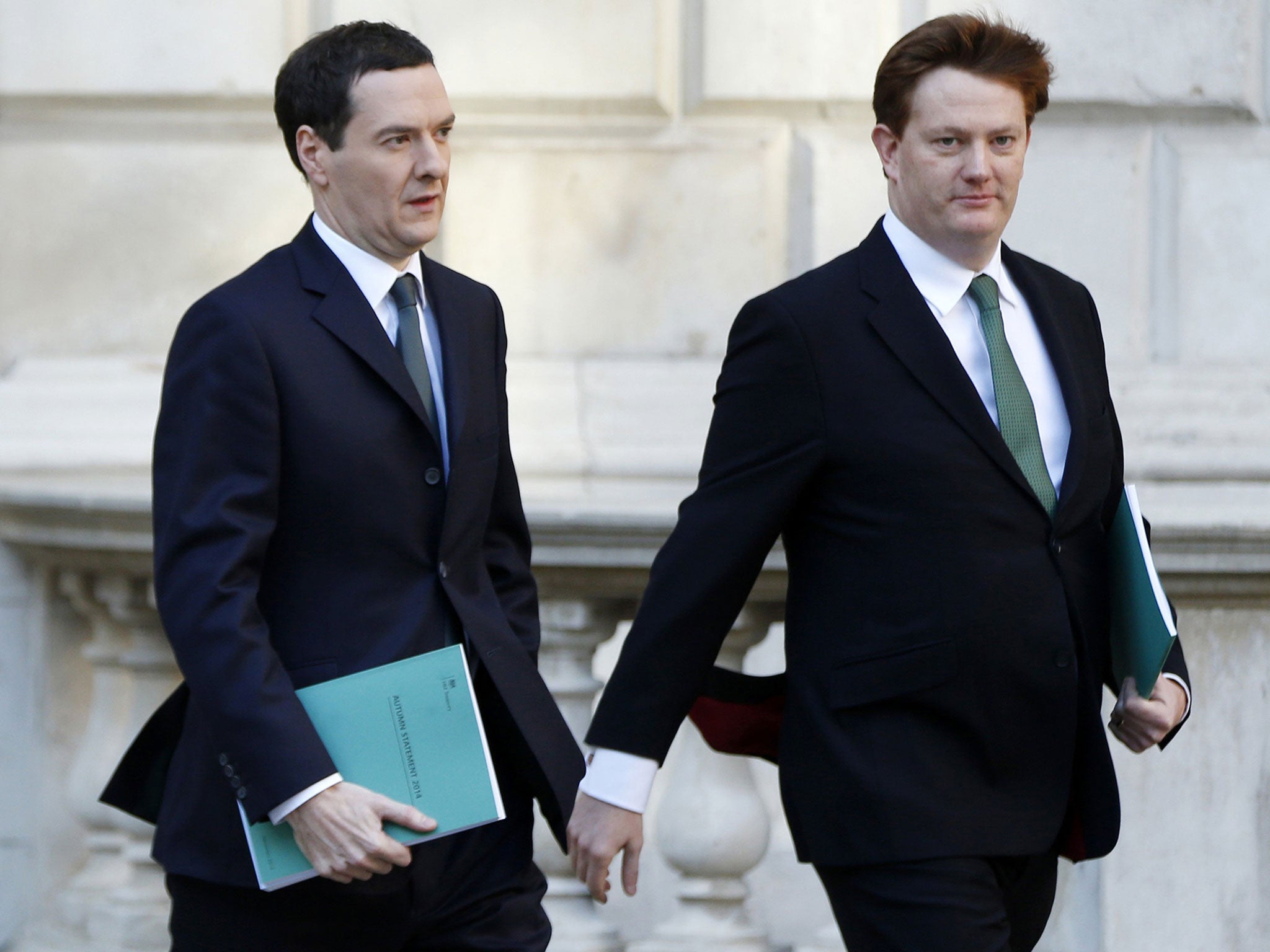 George Osborne and Chief Secretary to the Treasury Danny Alexander leave the Treasury to present the Autumn Statement to Parliament in London