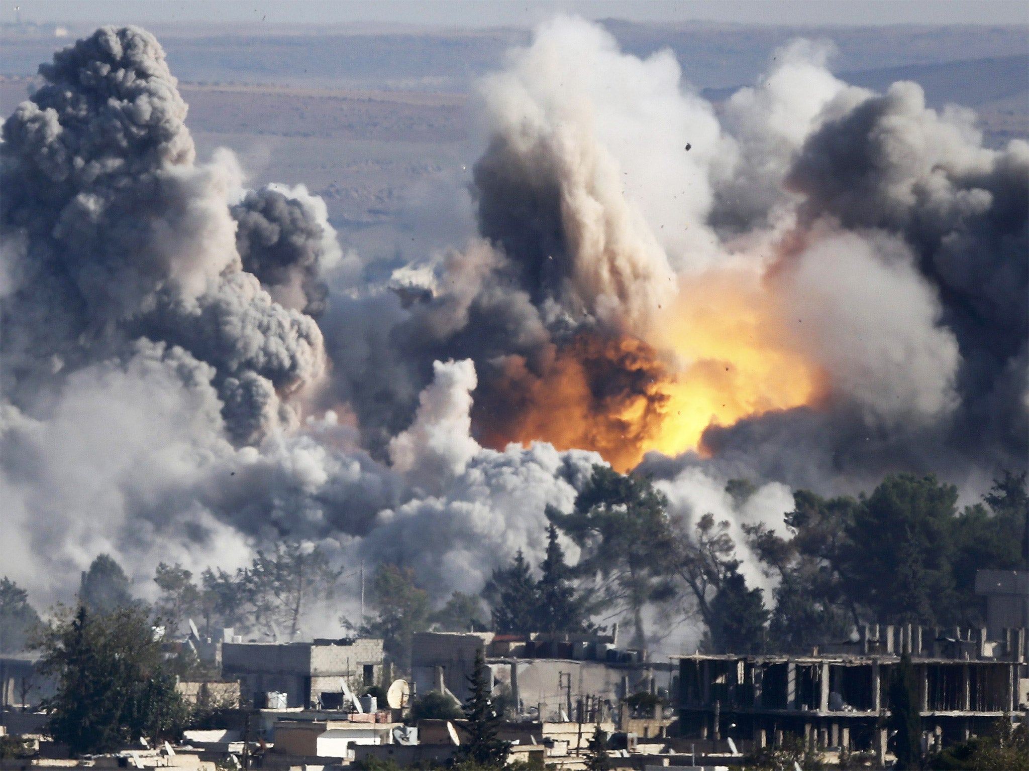 Smoke rises over Syrian town of Kobani after a recent airstrike