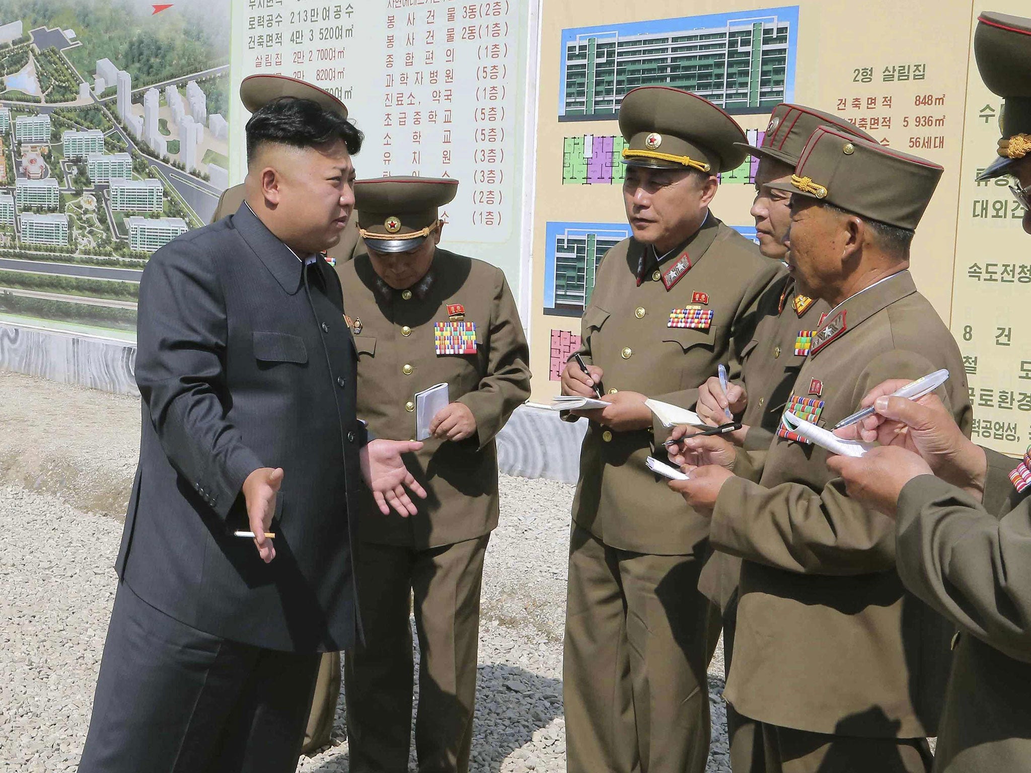 Kim gives on the spot guidance during an official visit