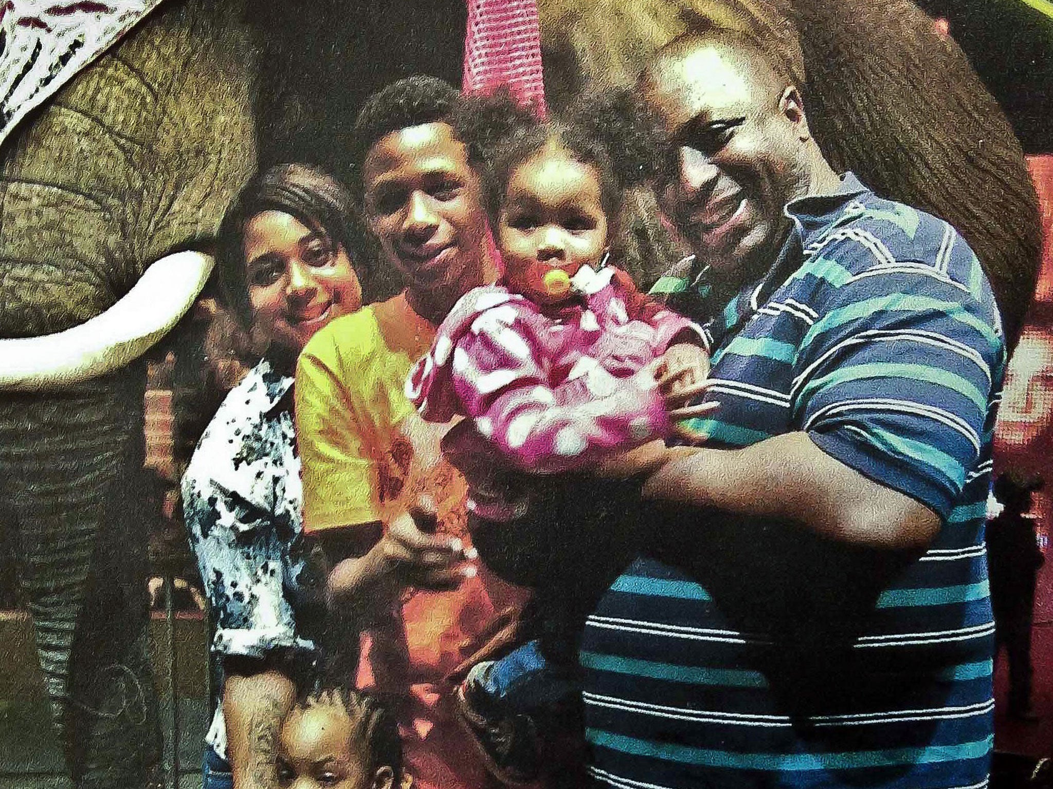 Eric Garner, right, with some of his six children during a family
outing