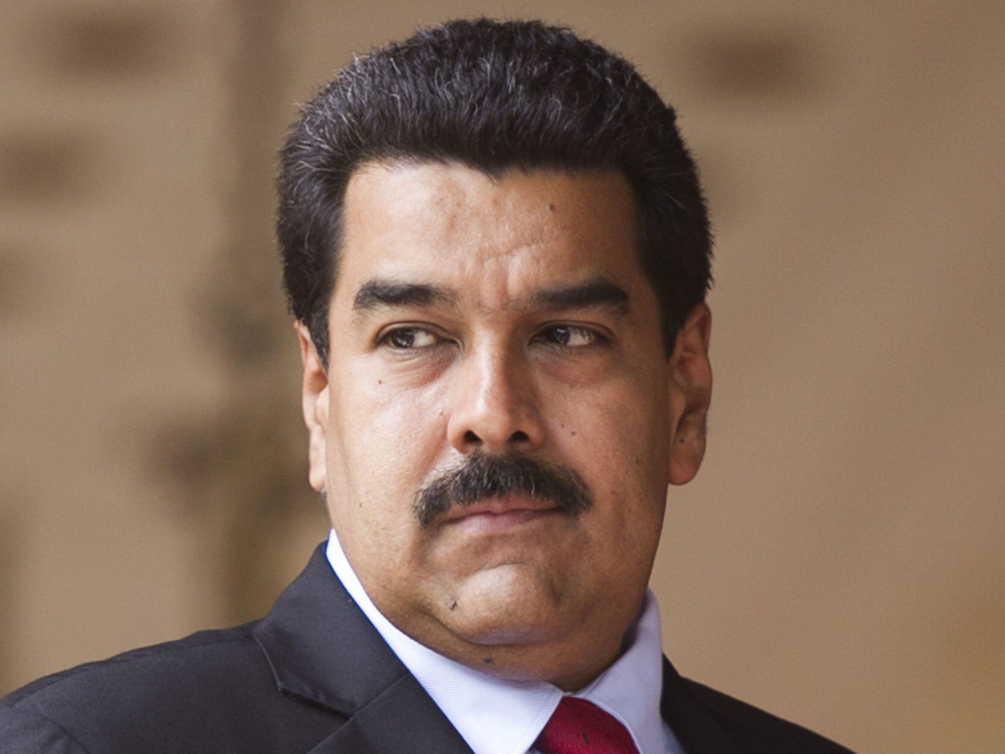 President Nicolas Maduro is accused of trying to silence government critics