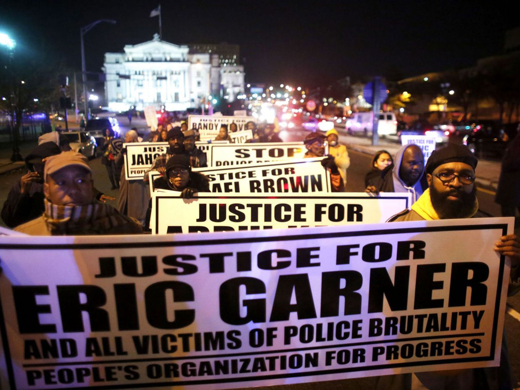 Protesters march in New York after a grand jury decided not to charge police over the death of Eric Garner