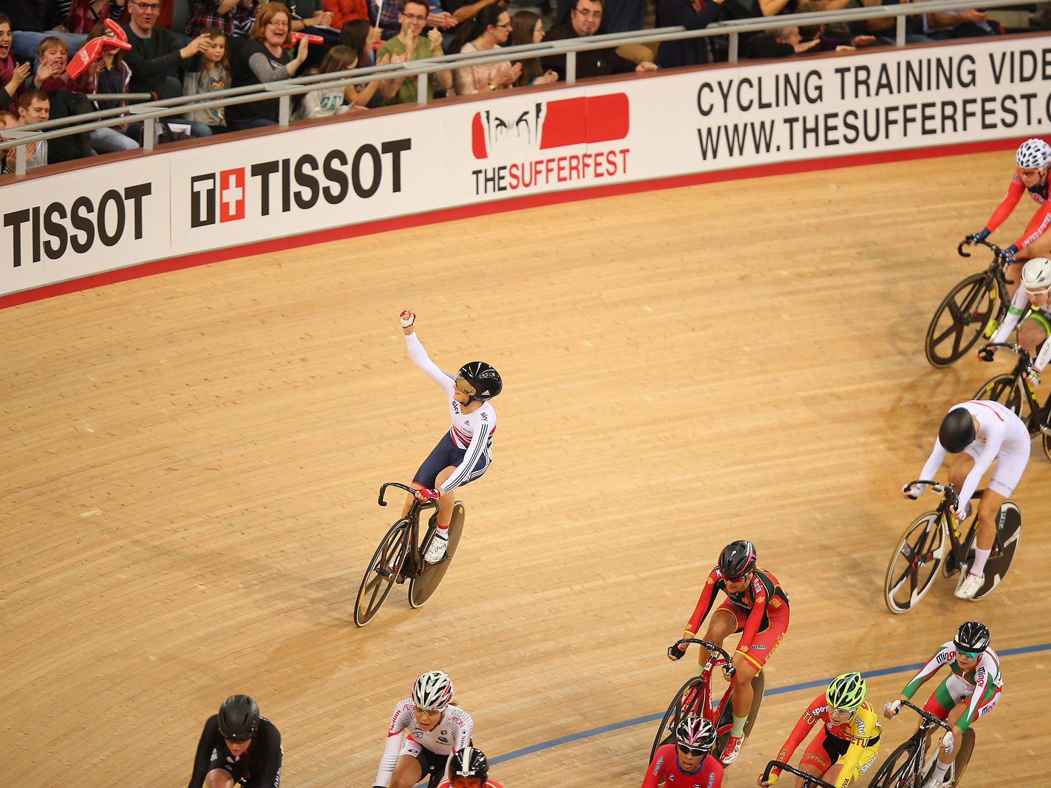 Laura Trott waves to the crowd after winning the Women's Omnium Scratch Race