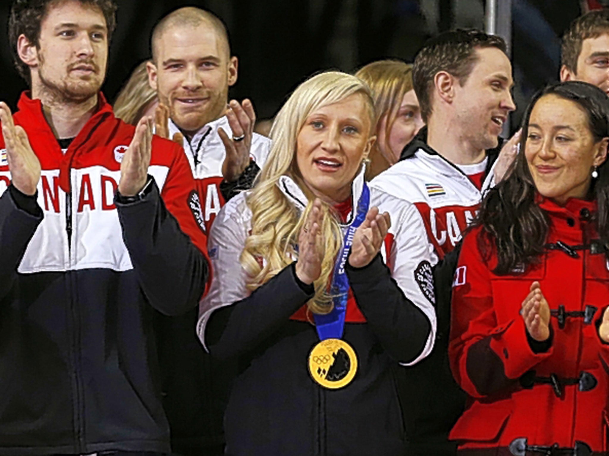 Breaking the ice: Kaillie Humphries (centre) piloted a men’s four-man bobsleigh to bronze at the Canadian Championships in Calgary last month, showing that mixed teams can work