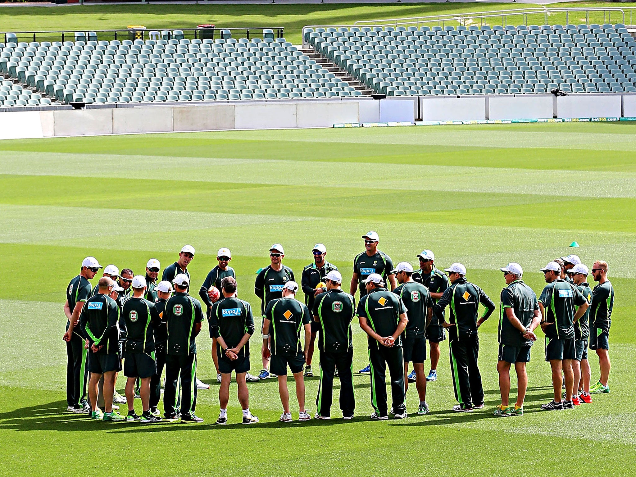 The Australian team gather in the middle before a nets session at the Adelaide Oval on Sunday