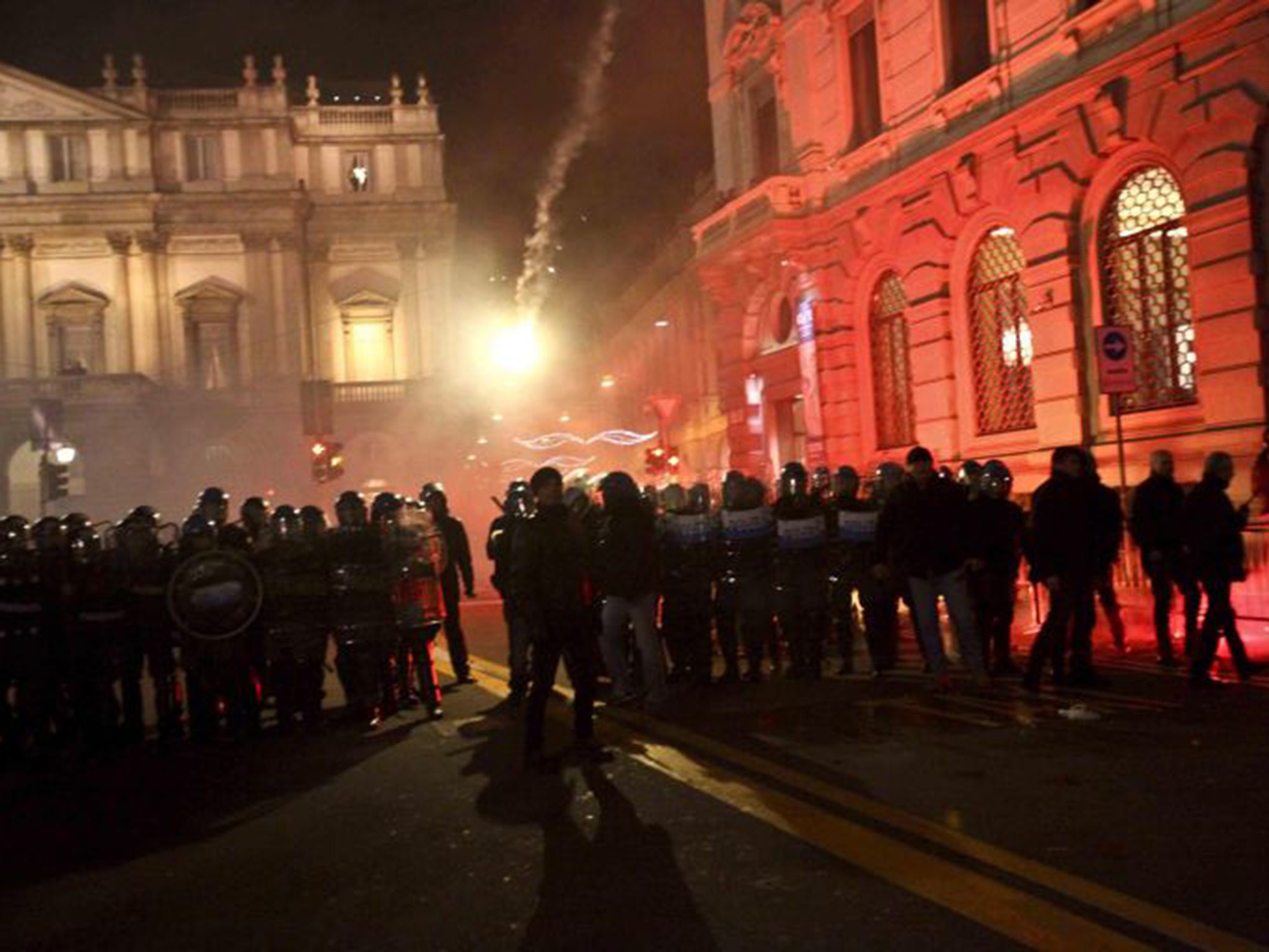 Protesters clash with police outside La Scala on Sunday night
