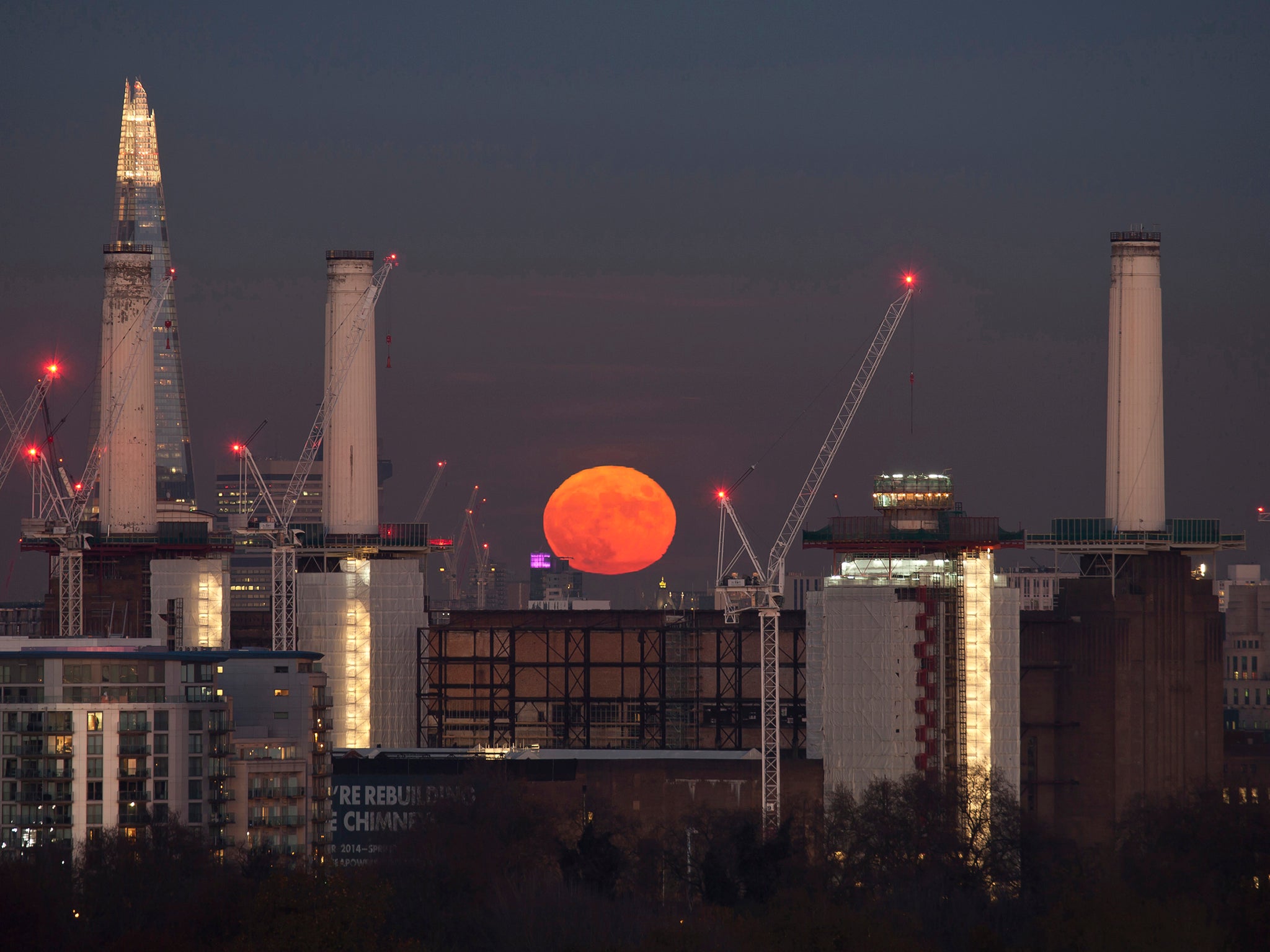 Stunning images from the photographer James Burns showed London illuminated by a seemingly huge full moon.