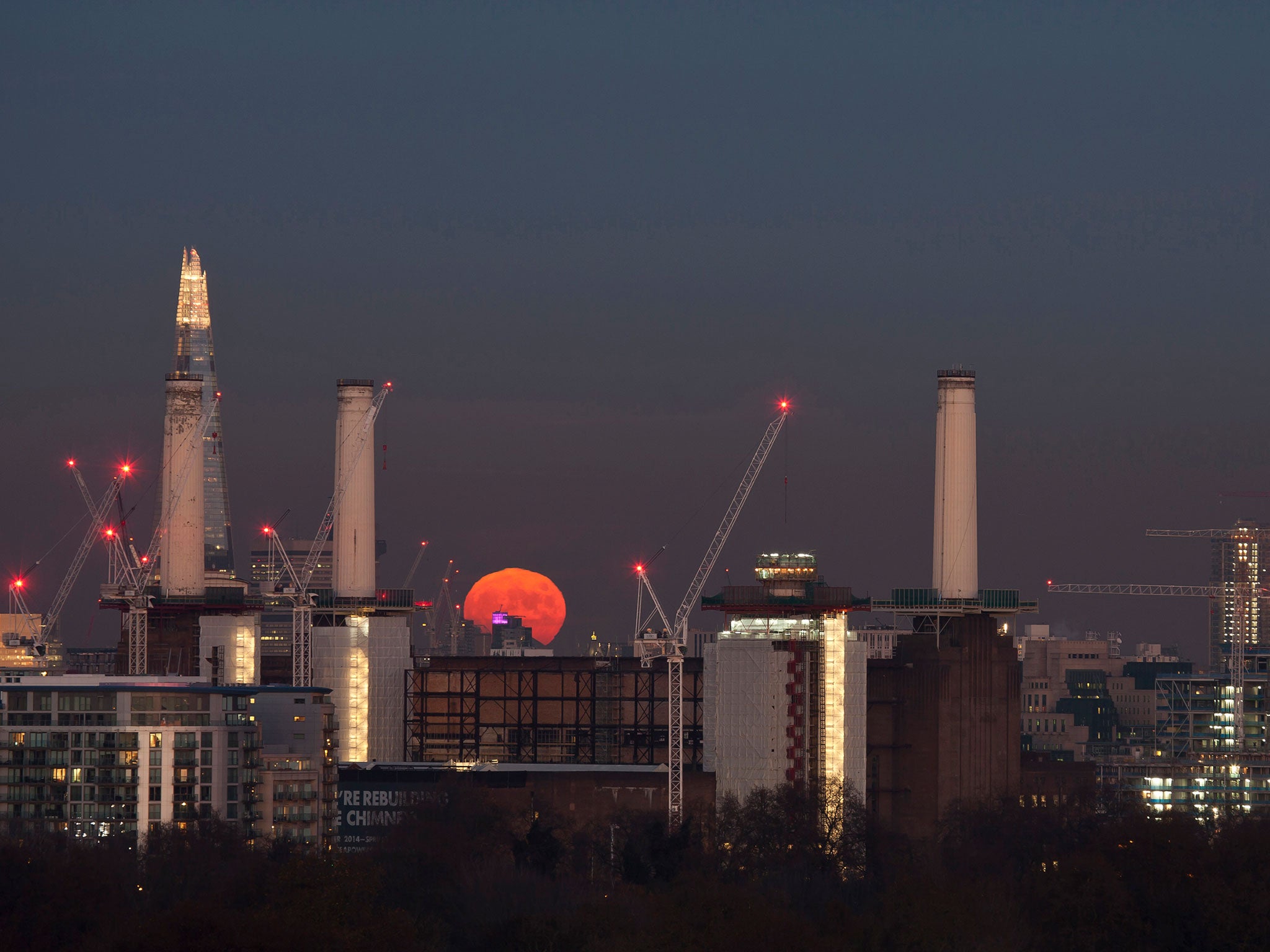 Stunning images from the photographer James Burns showed London illuminated by a seemingly huge full moon.