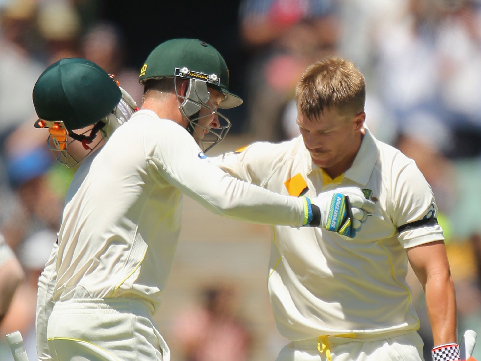 Michael Clarke embraces Warner after he reaches his century