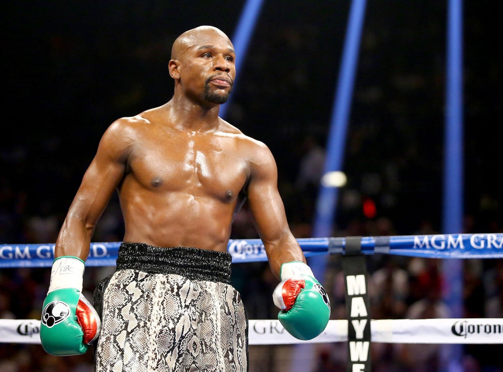 Floyd 'Money' Mayweather shows off 'toy' wealth by posing ...