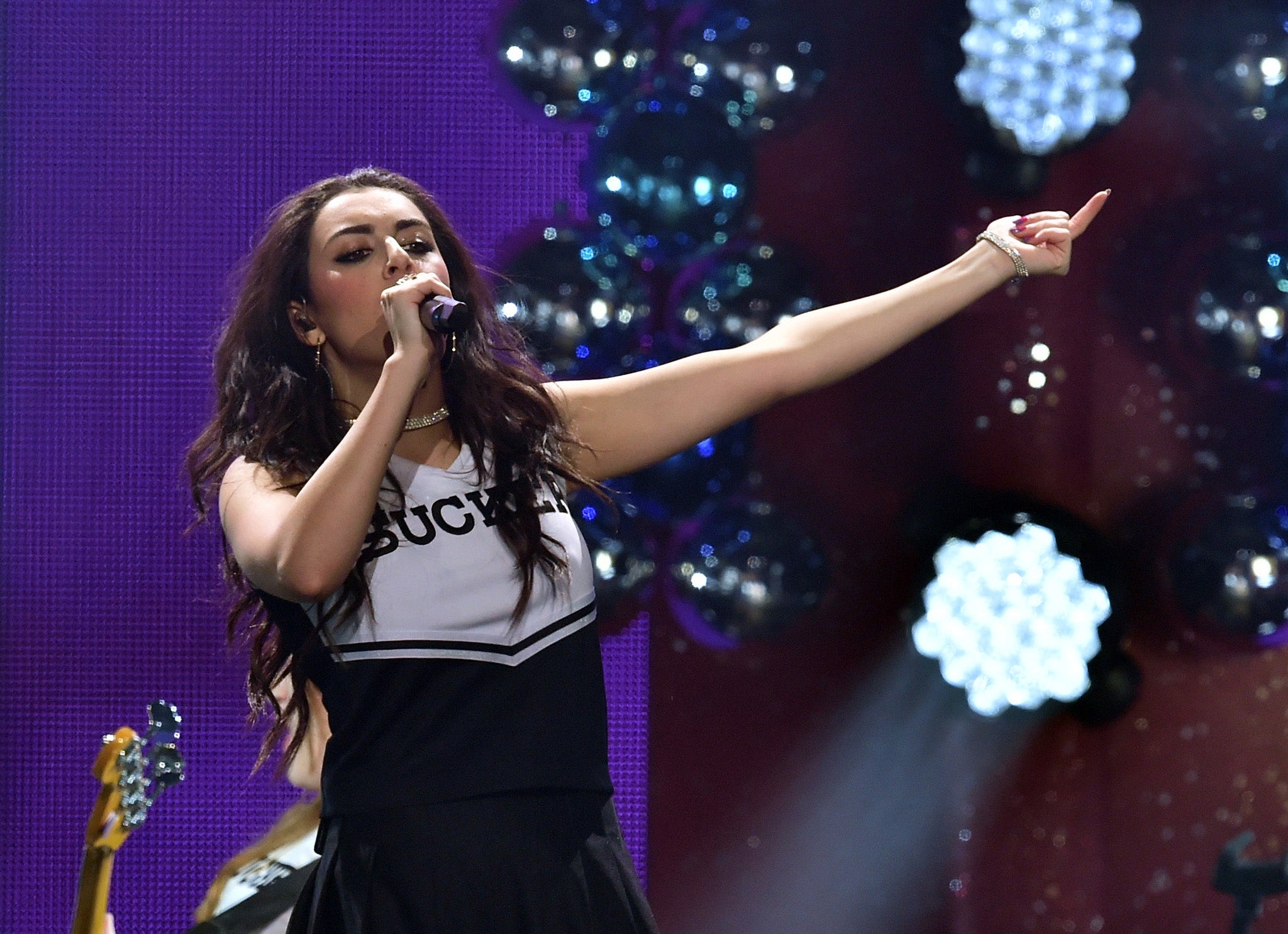 Charli XCX performs on stage at the Capital Wintertime Ball
