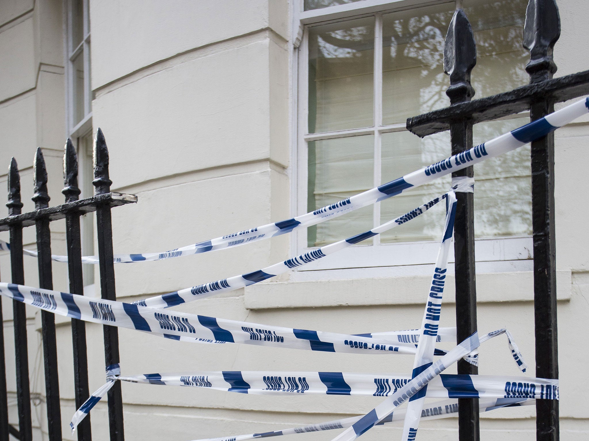 The man was impaled on railings after falling 60ft from the window of a luxury penthouse