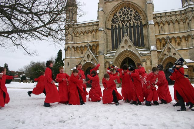 St Albans Cathedral Choristers taking time out from their rehearsals for some snowballing