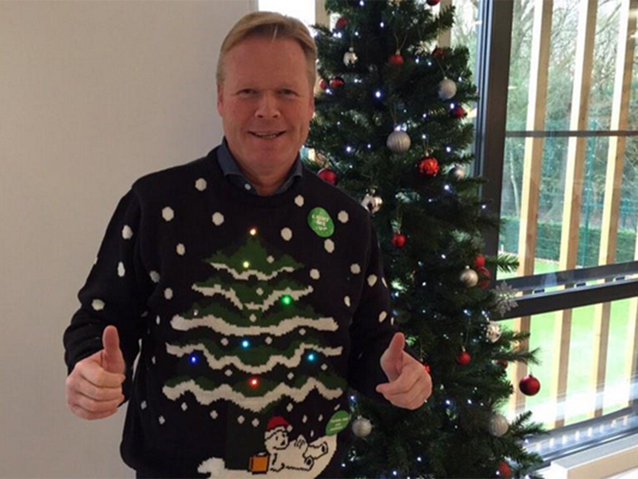 Ronald Koeman poses in a Christmas jumper
