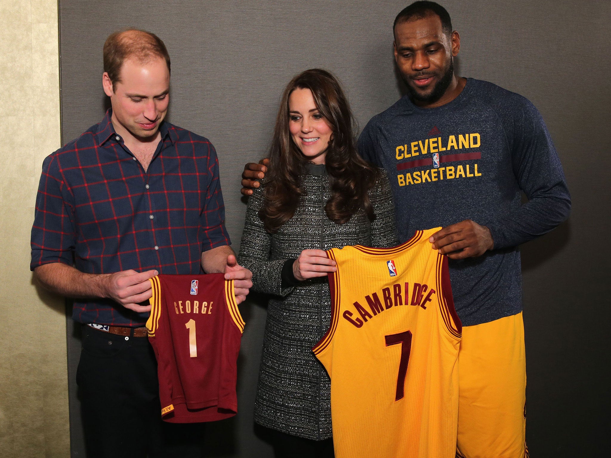 Prince William and Catherine, Duchess of Cambridge pose with LeBron James as they attend the Cleveland Cavaliers vs. Brooklyn Nets NBA game at Barclays Center in the Brooklyn borough of New York