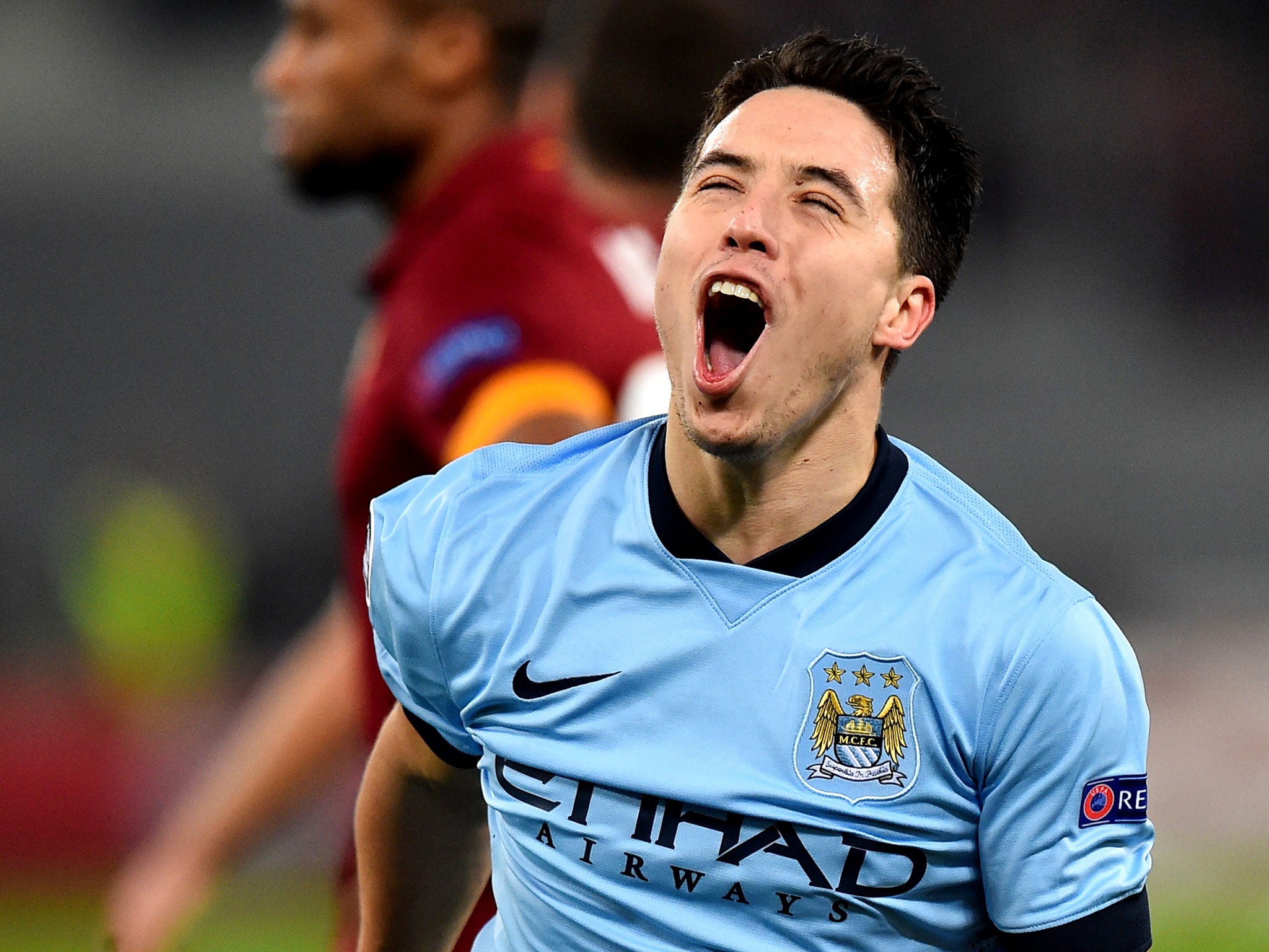 Samir Nasri cannot contain his delight after putting City 1-0 ahead