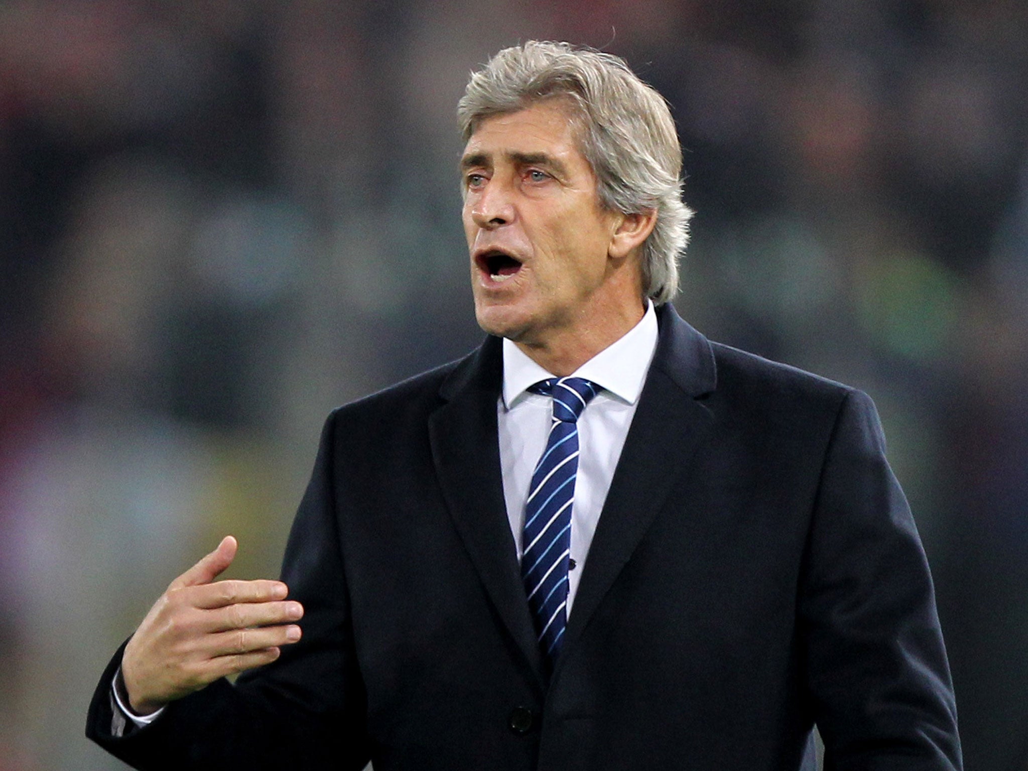 Manuel Pellegrini reacts on the touchline in Rome