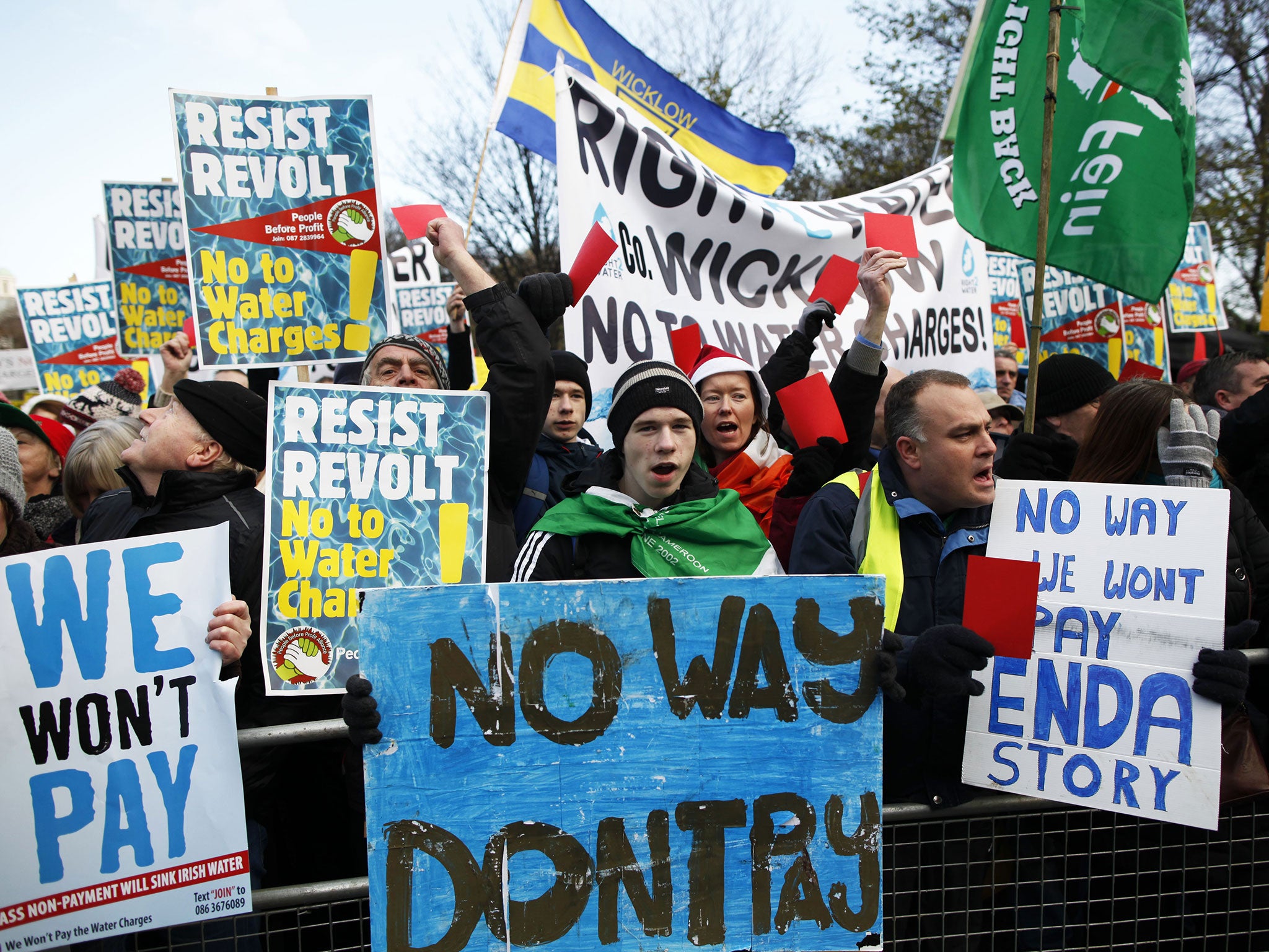 Water tax protesters demonstrate close to government buildings in Dublin city centre