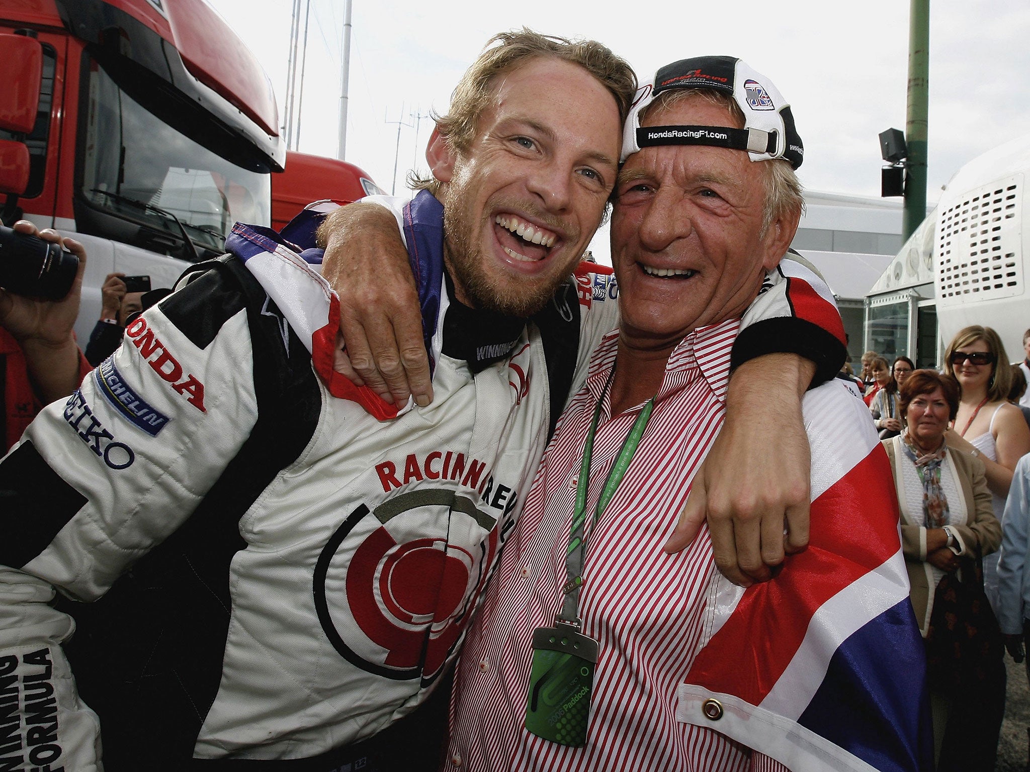 Button celebrates with his late father John after his first ever victory